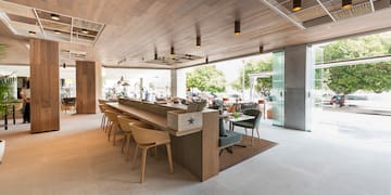 a restaurant with tables and chairs
