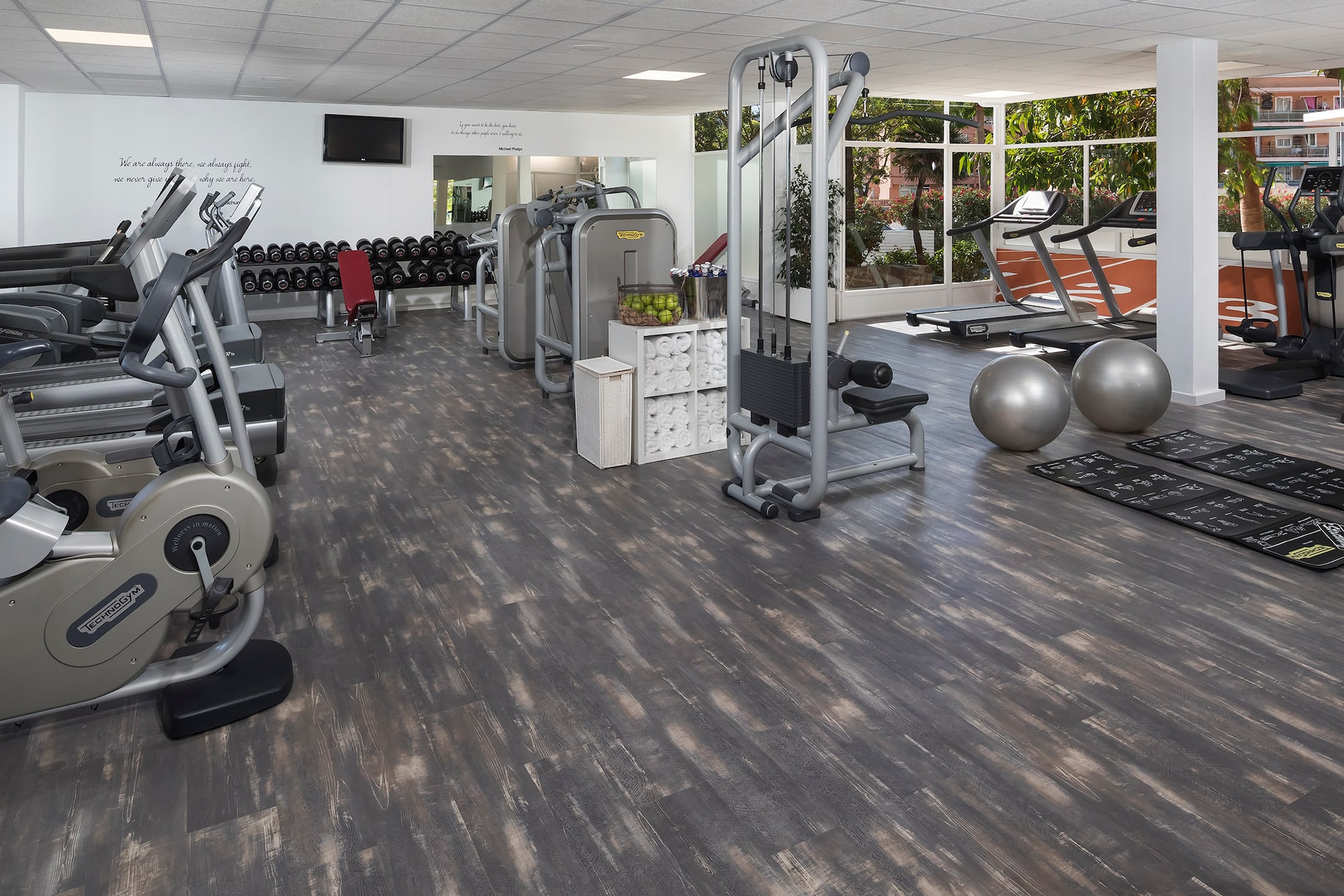 a large room with exercise equipment