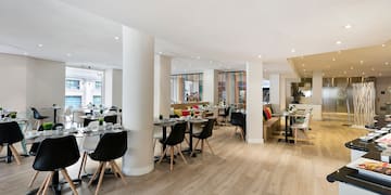 a room with tables and chairs