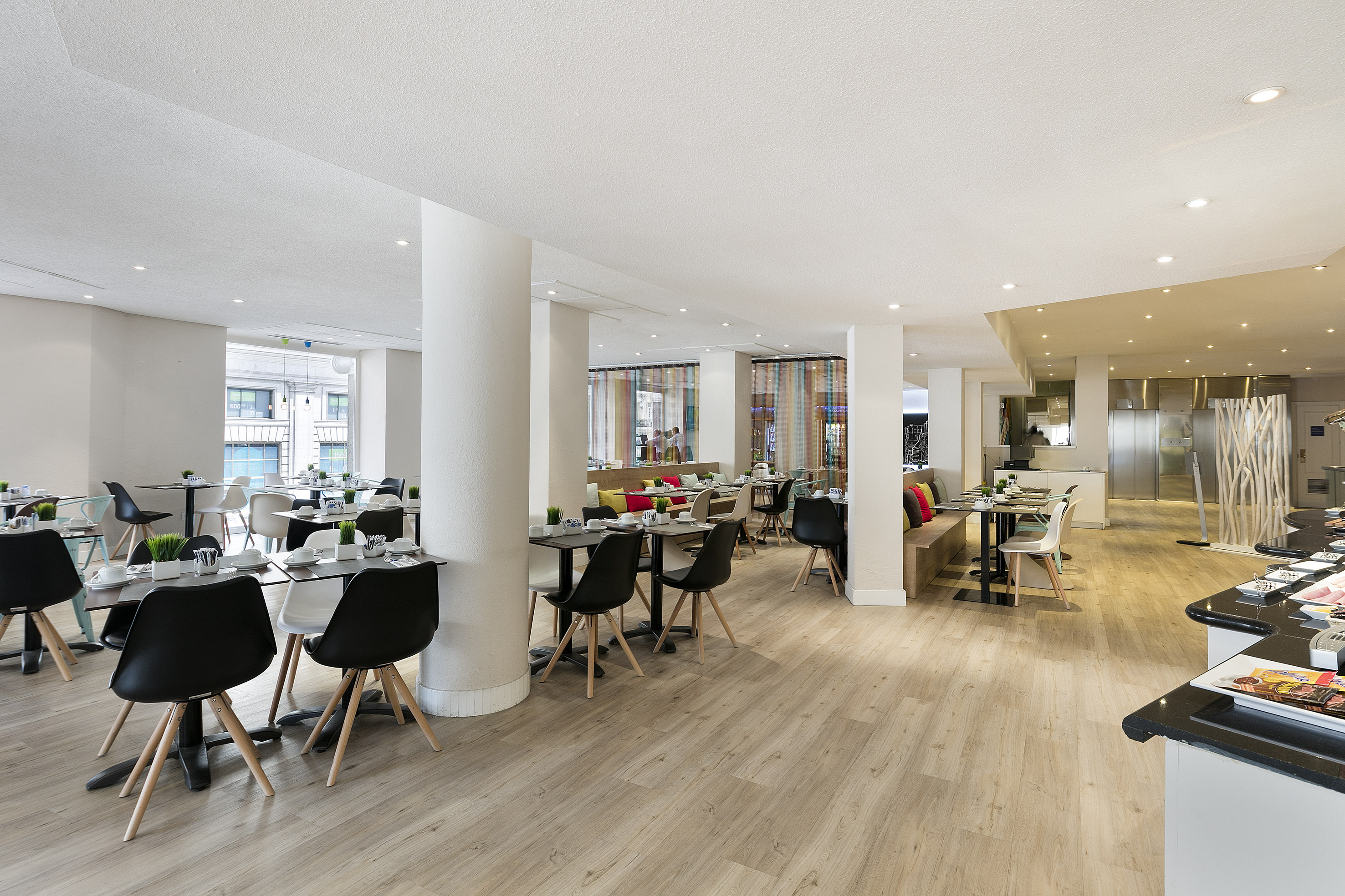 a room with tables and chairs