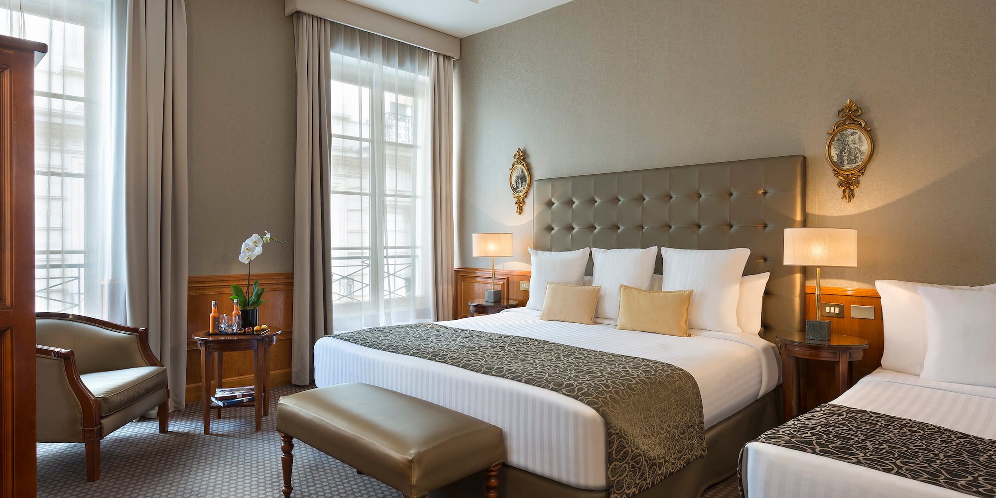 a bedroom with a bed and a table