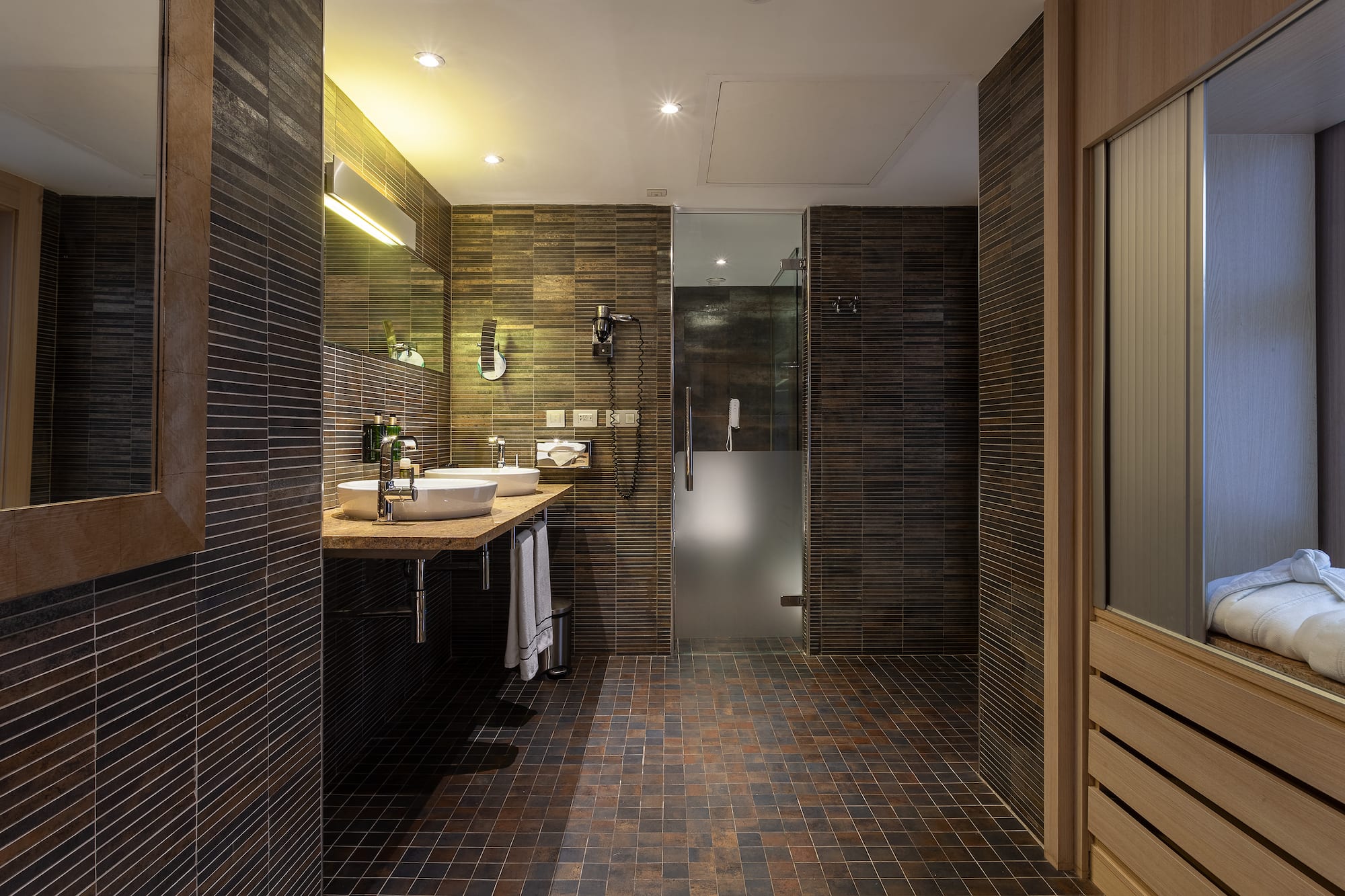 a bathroom with a sink and shower