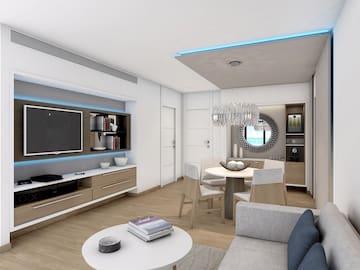 a living room with a tv and a table