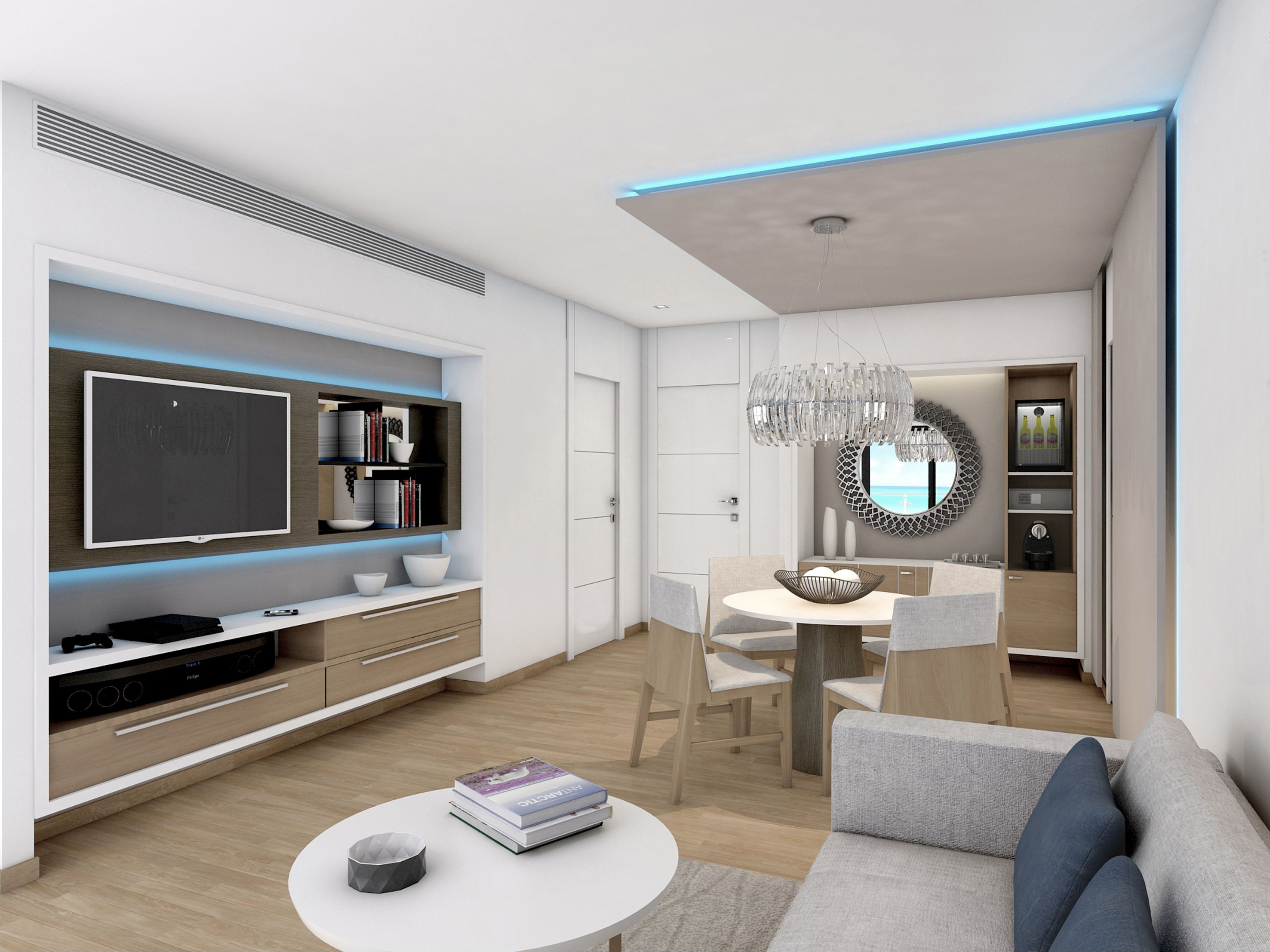 a living room with a tv and a table