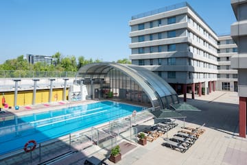 a swimming pool next to a building