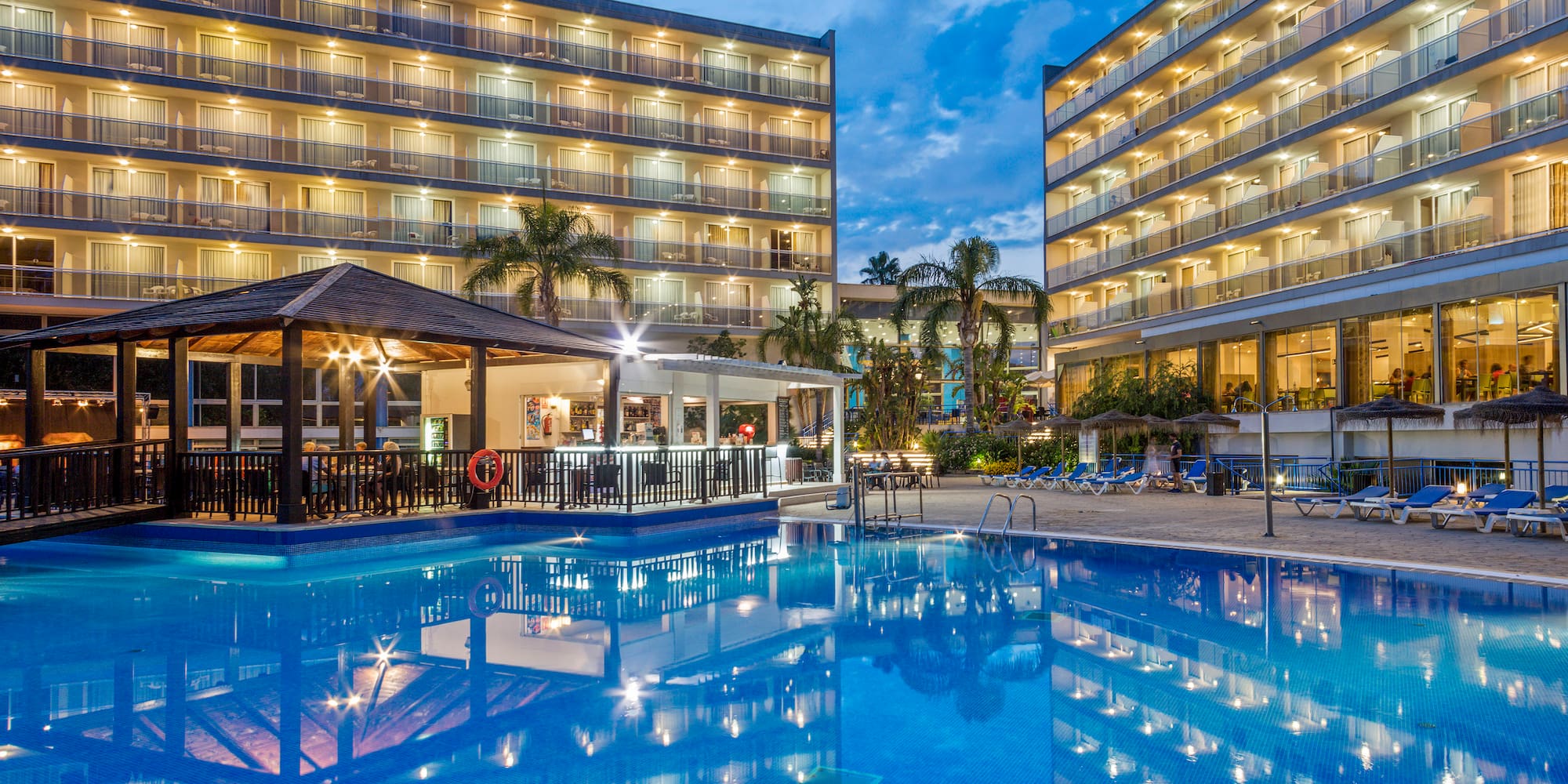 a pool with lights on it