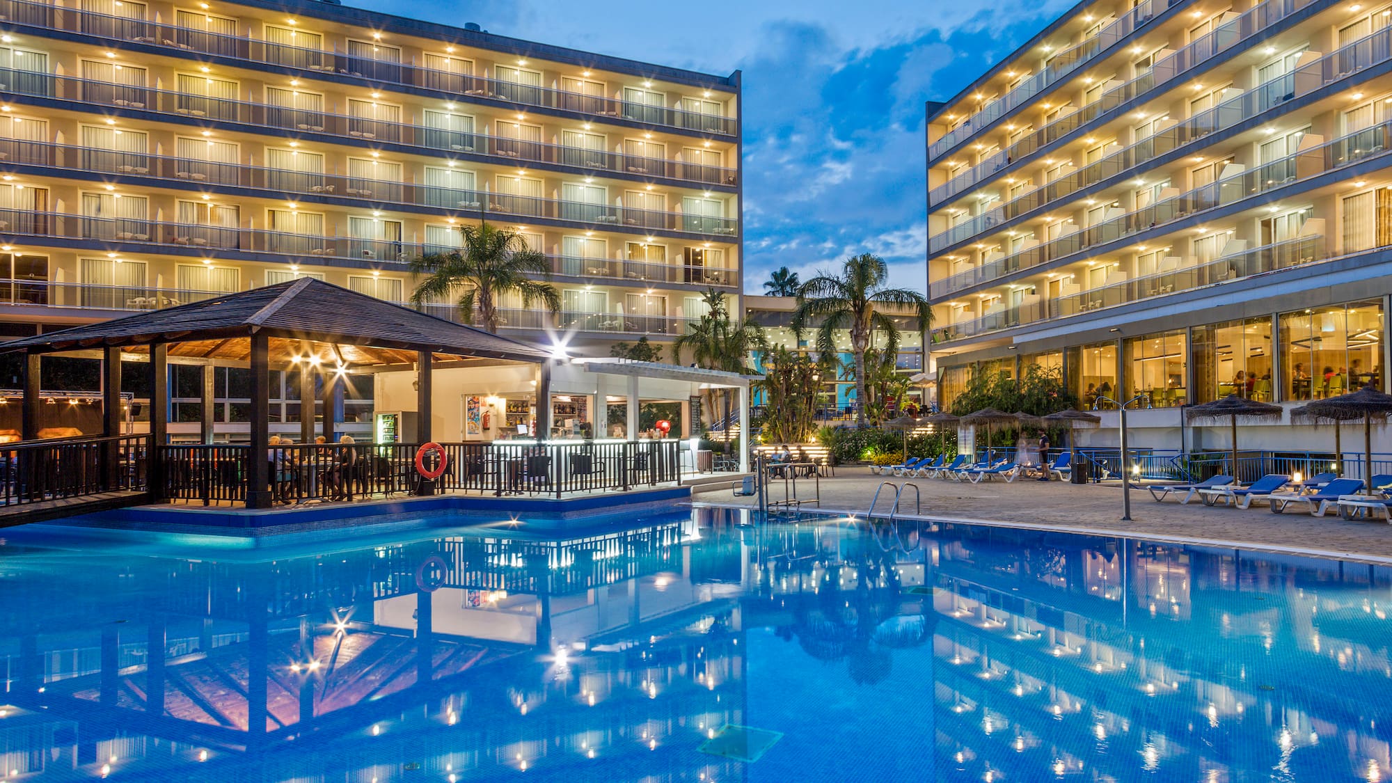 a pool with lights on it