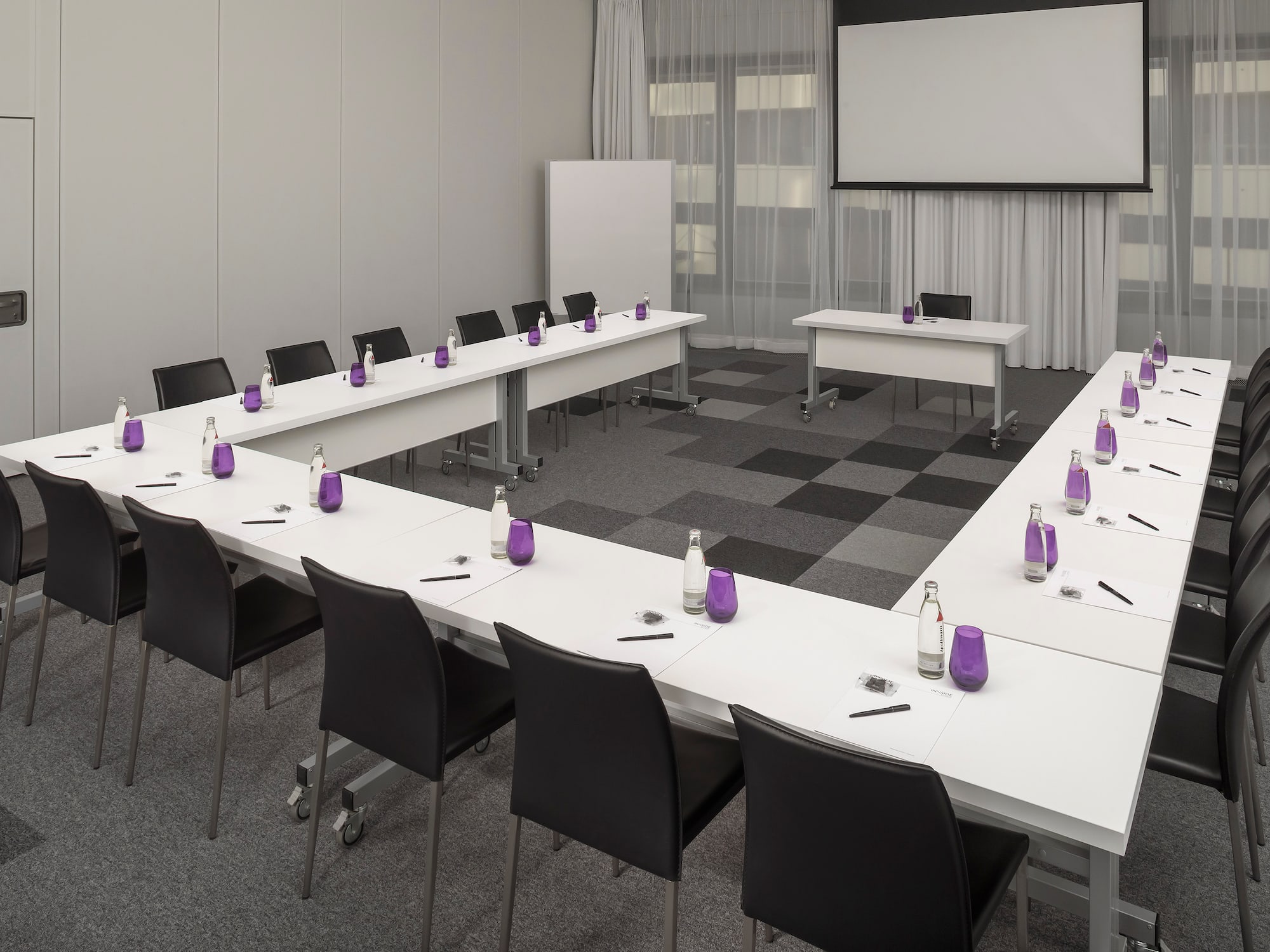 a room with tables and chairs