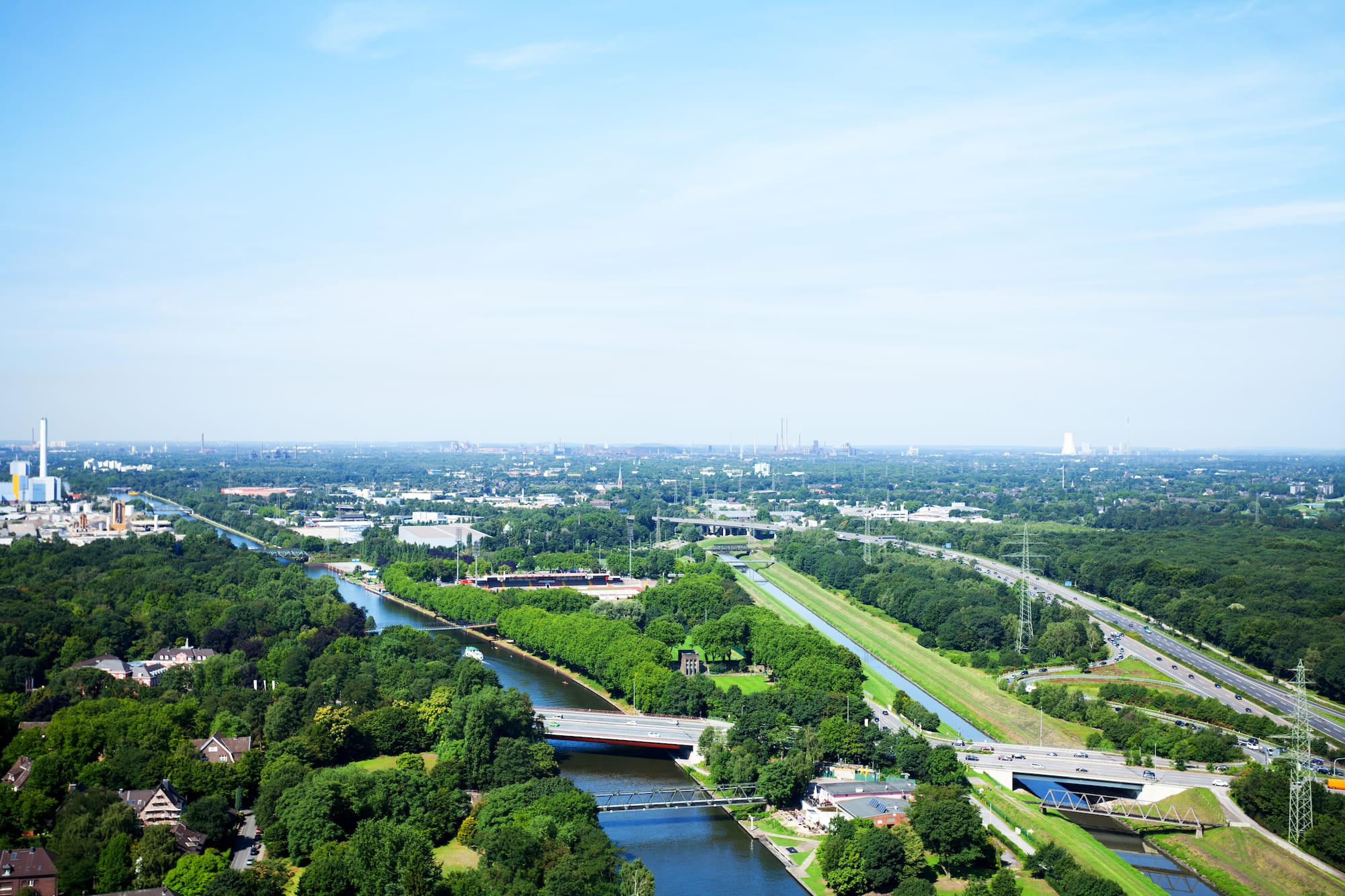 a river with trees and roads