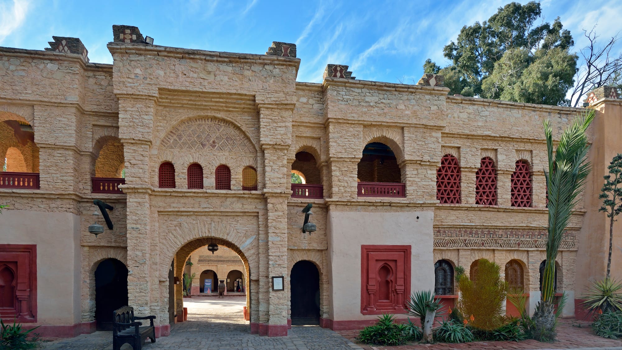 a building with a stone wall