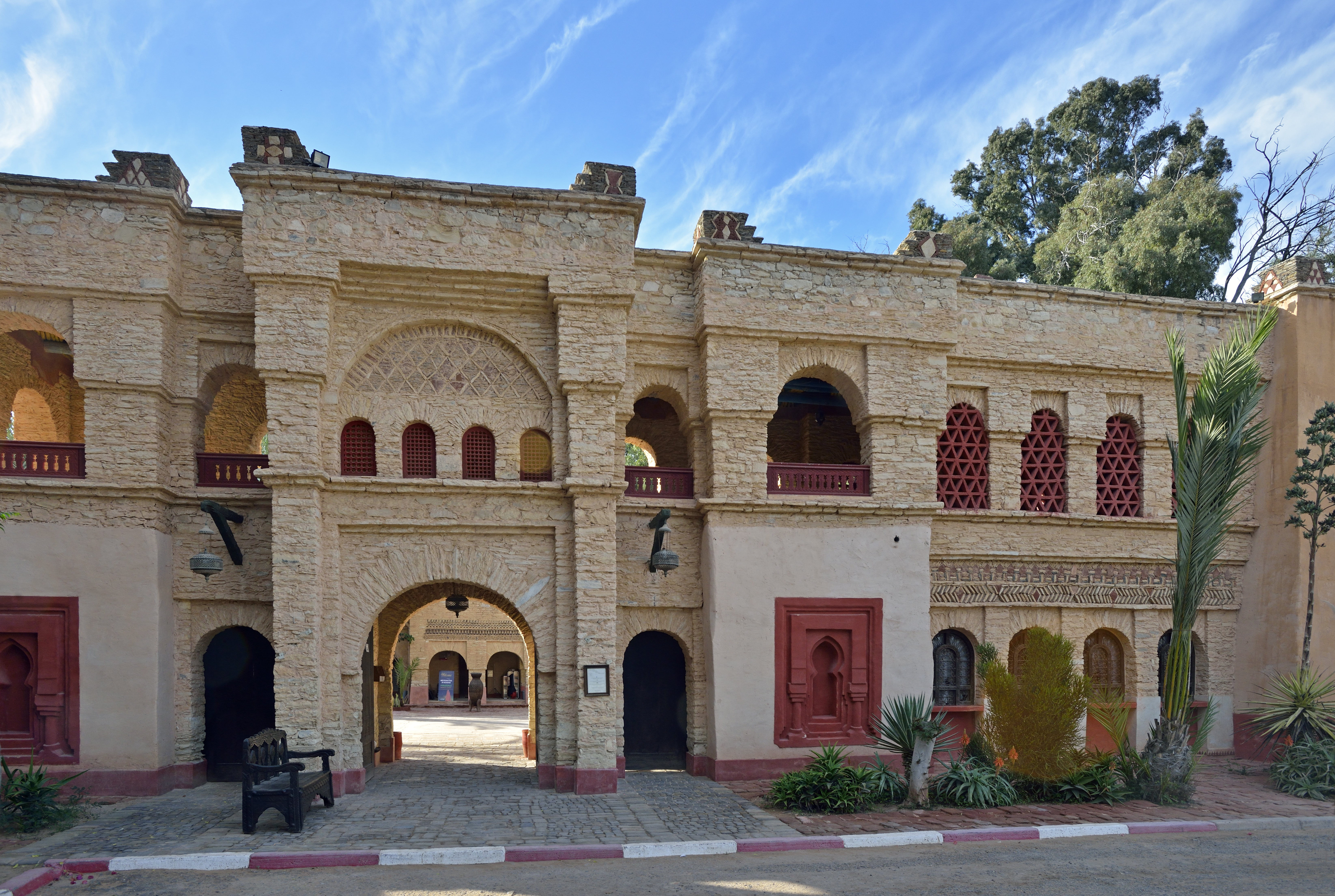 a building with a stone wall