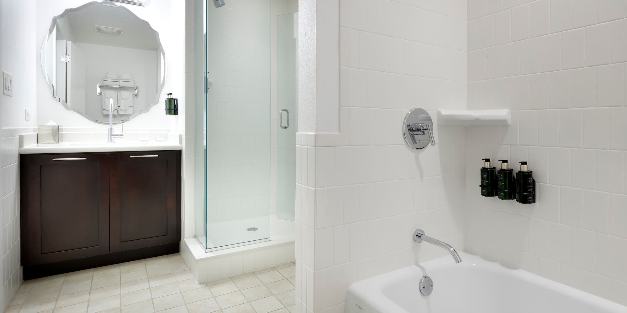 a bathroom with a shower and tub