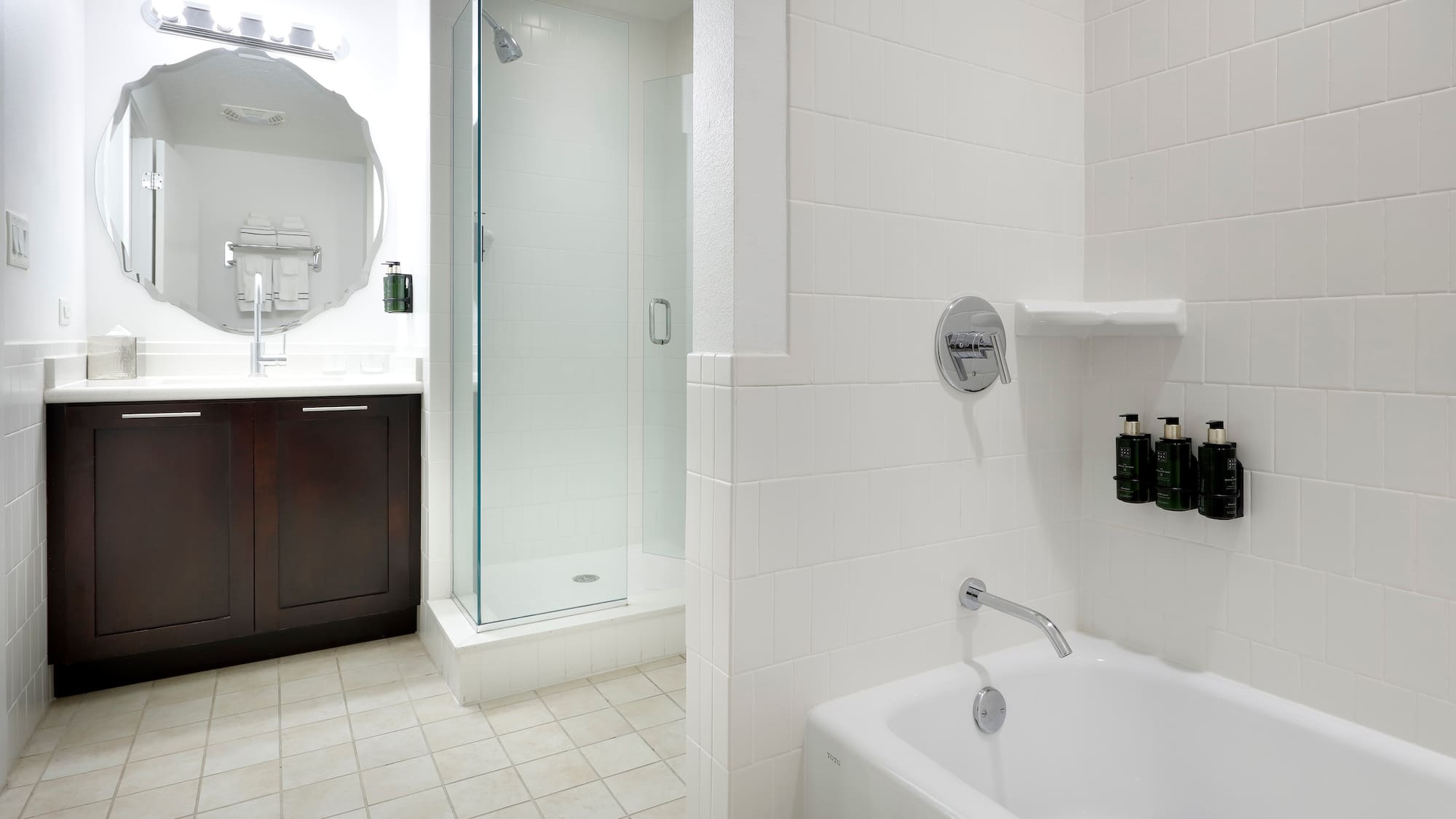 a bathroom with a shower and tub