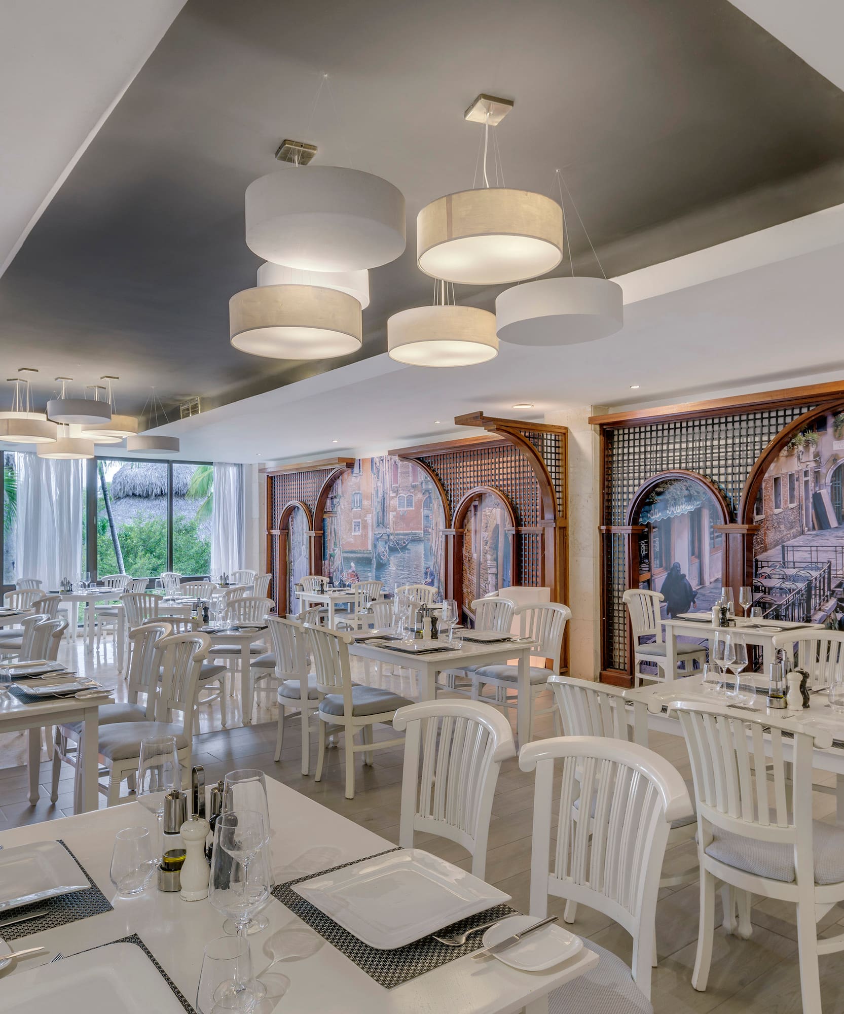 a room with tables and chairs