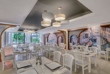 a room with tables and chairs