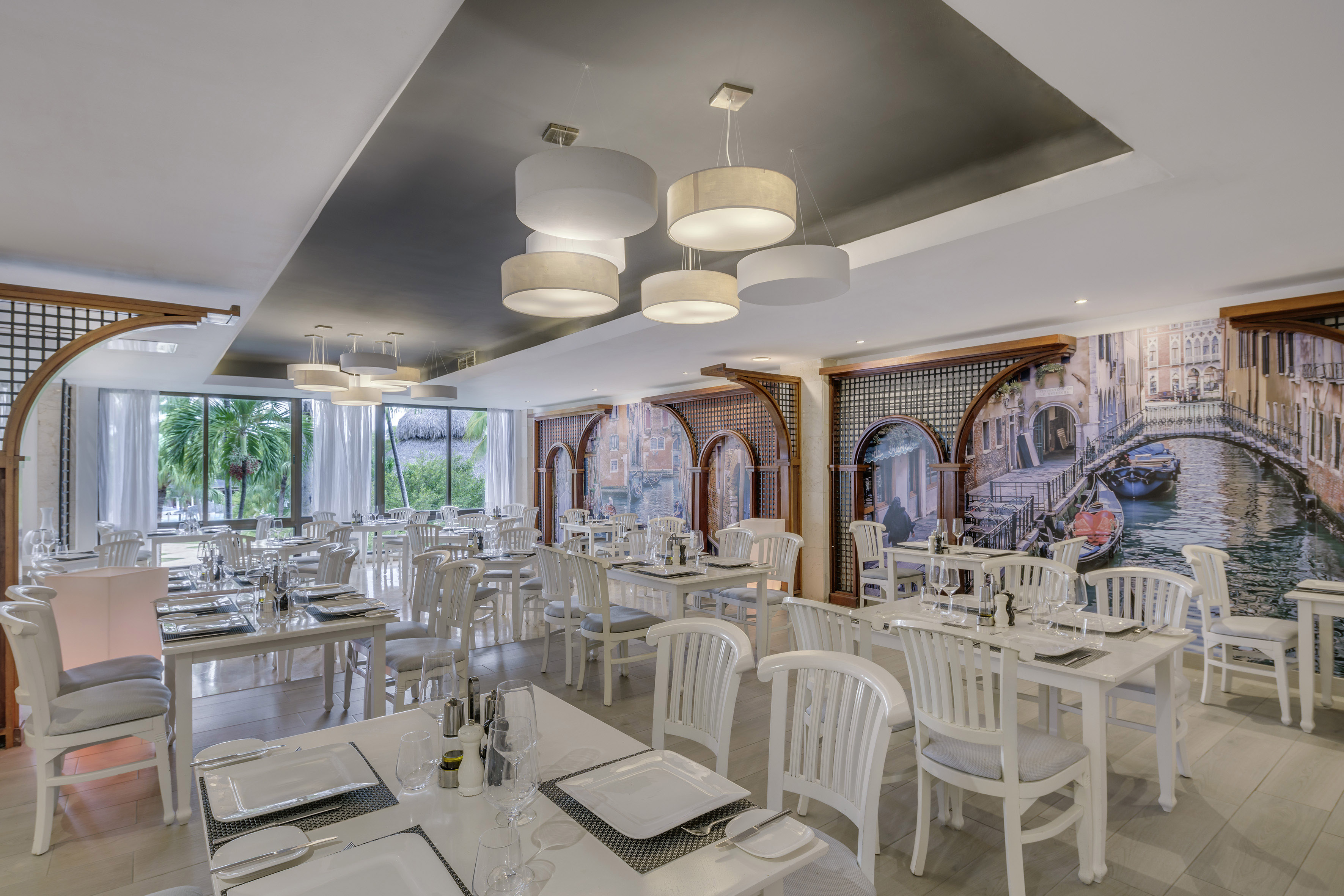 a room with tables and chairs