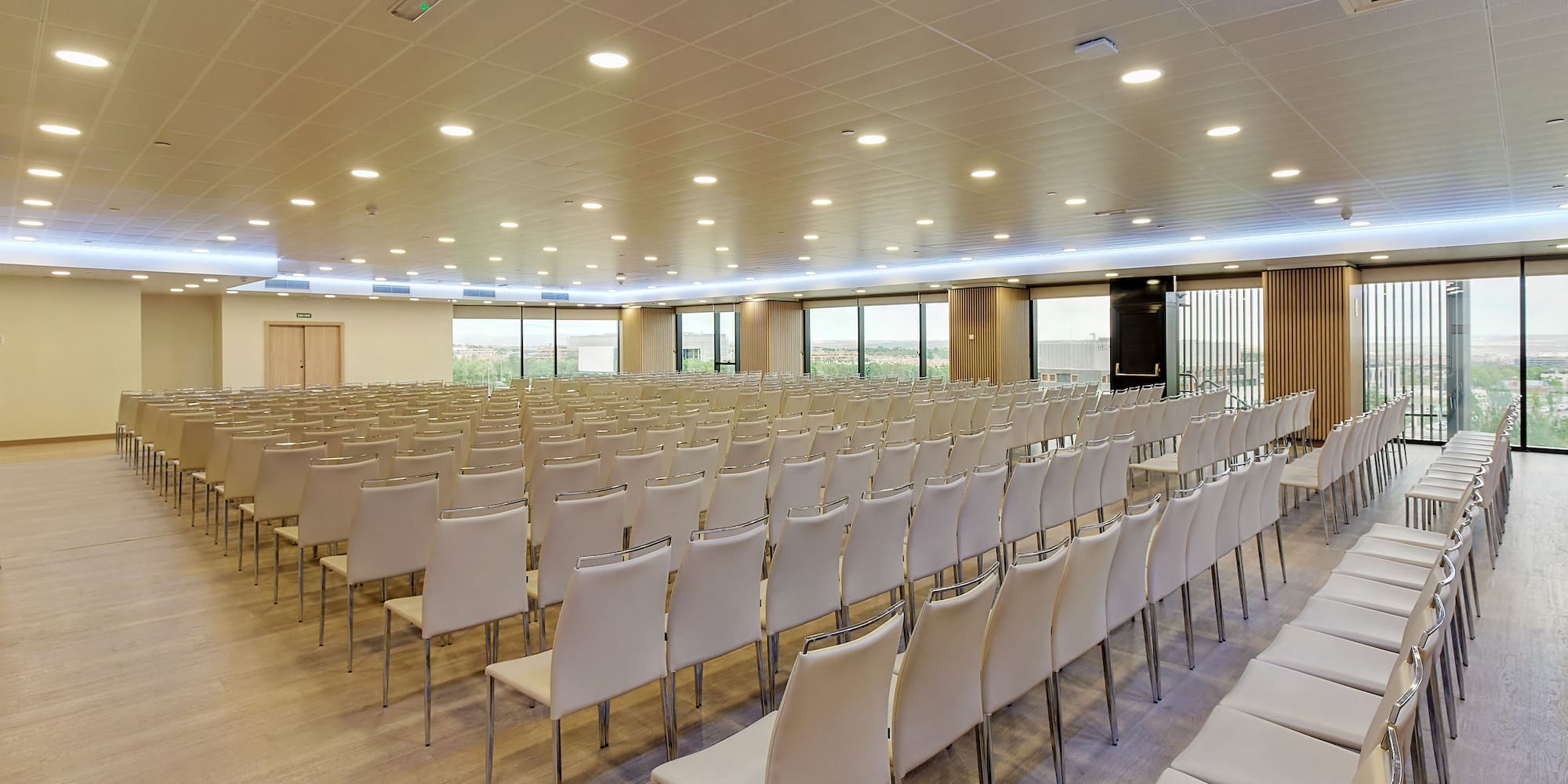 a room with rows of chairs