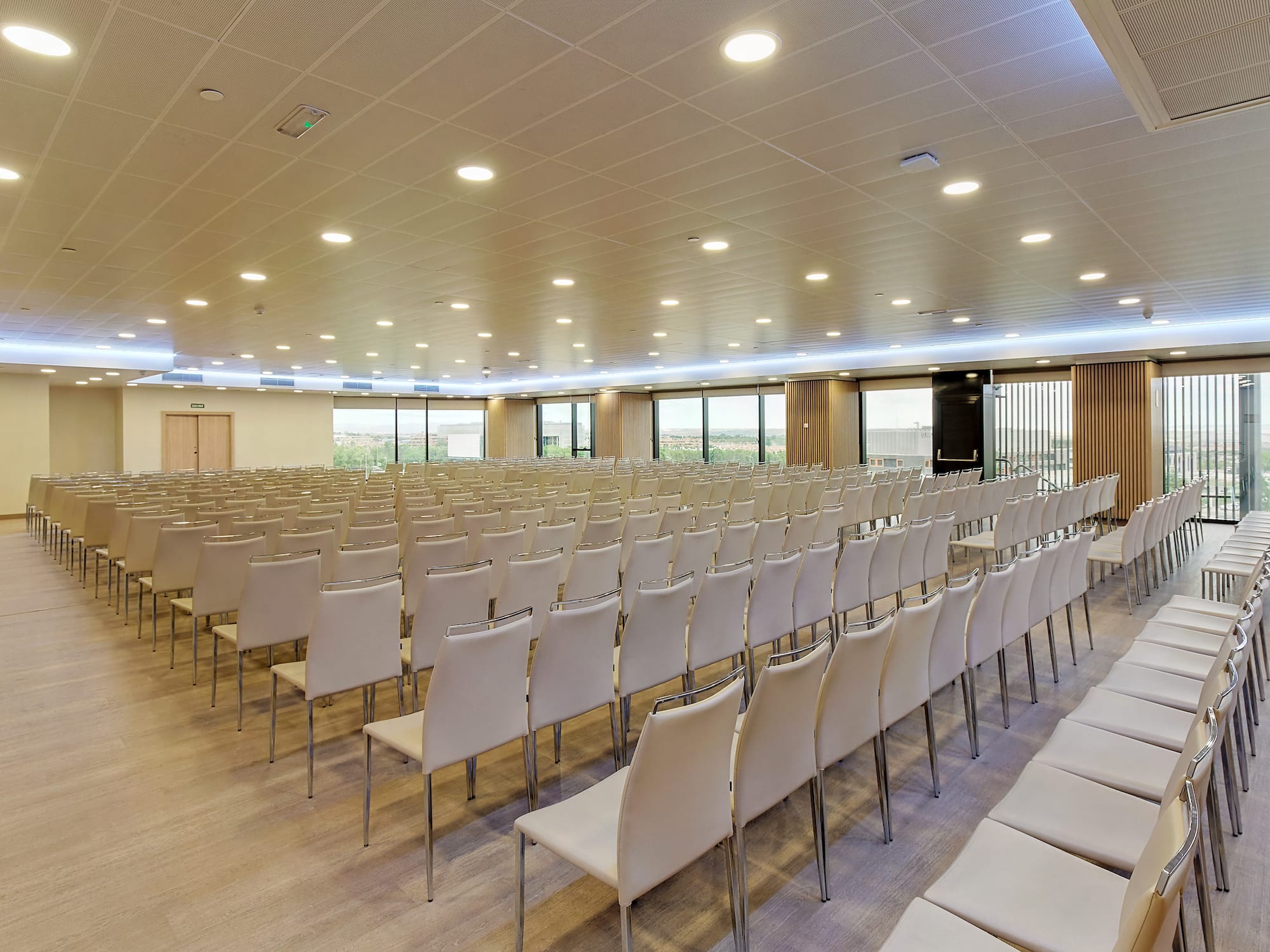 a room with rows of chairs