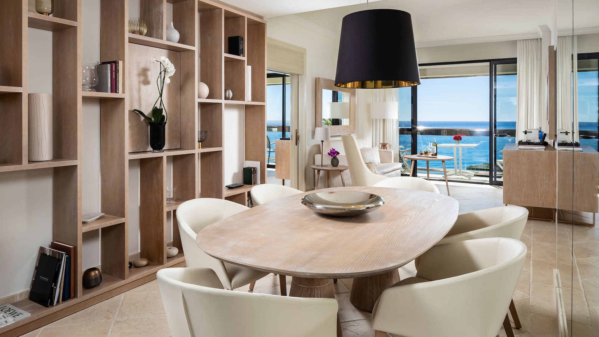 a room with a table and chairs