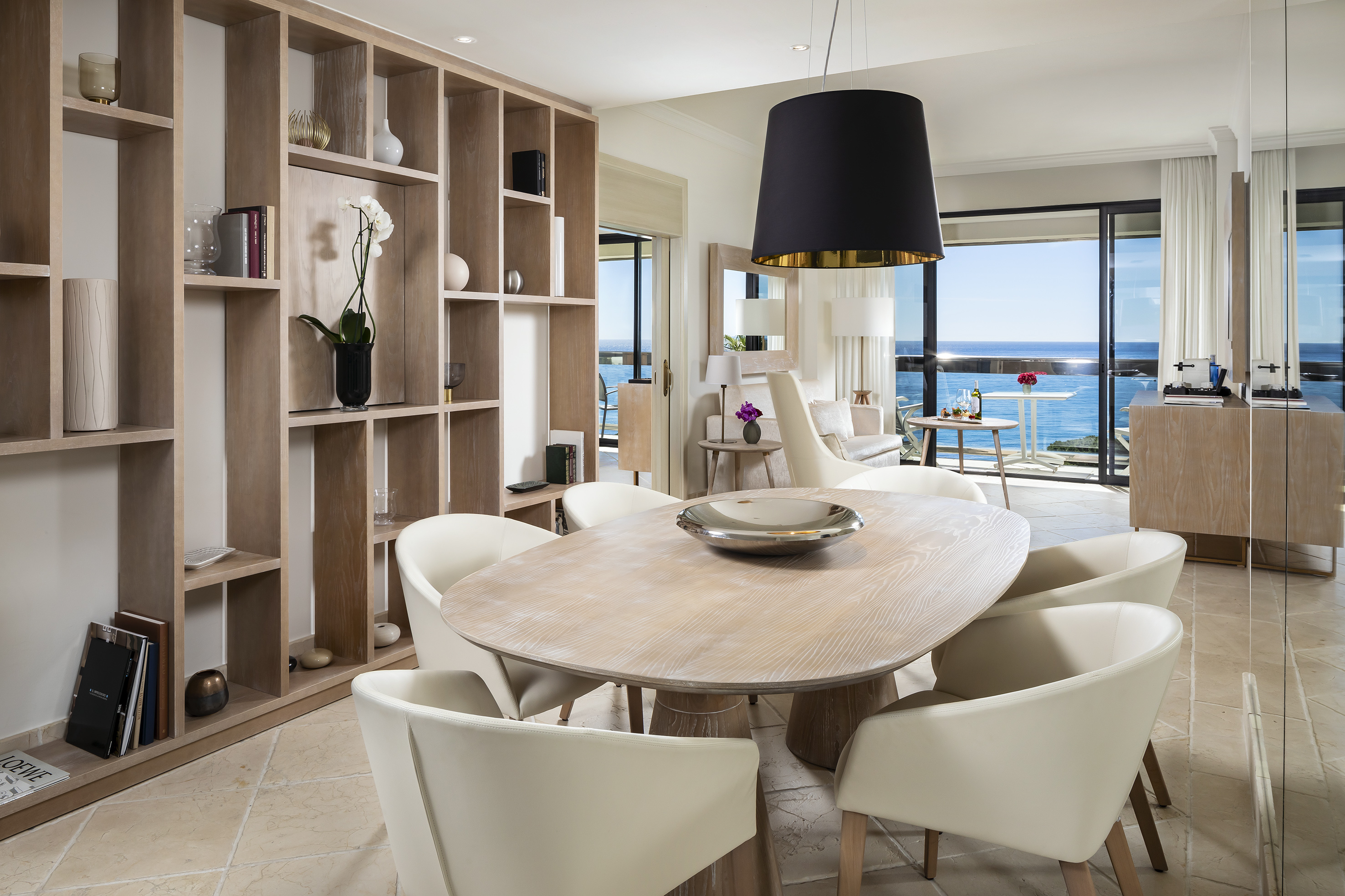 a room with a table and chairs