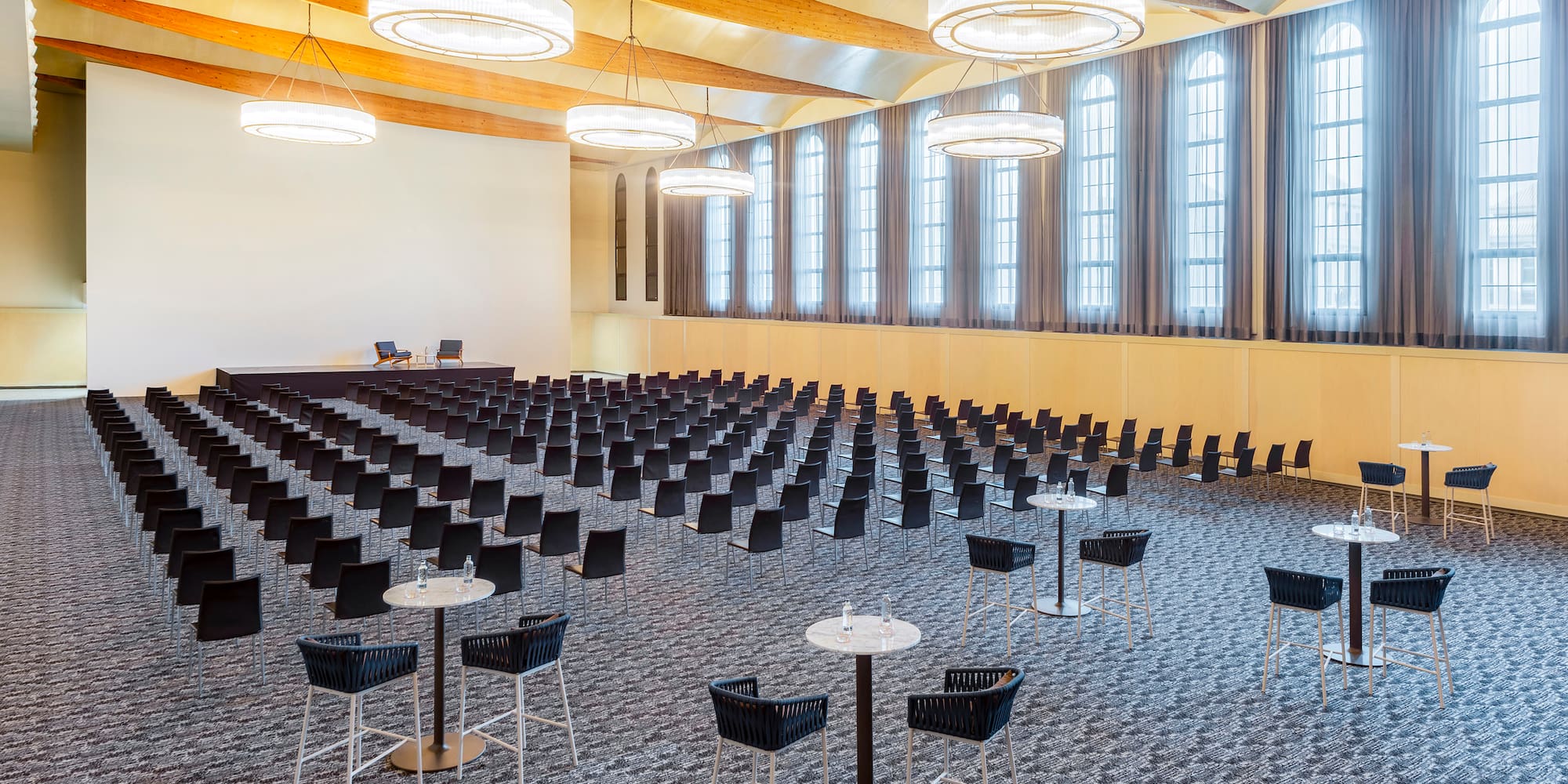 a large room with tables and chairs