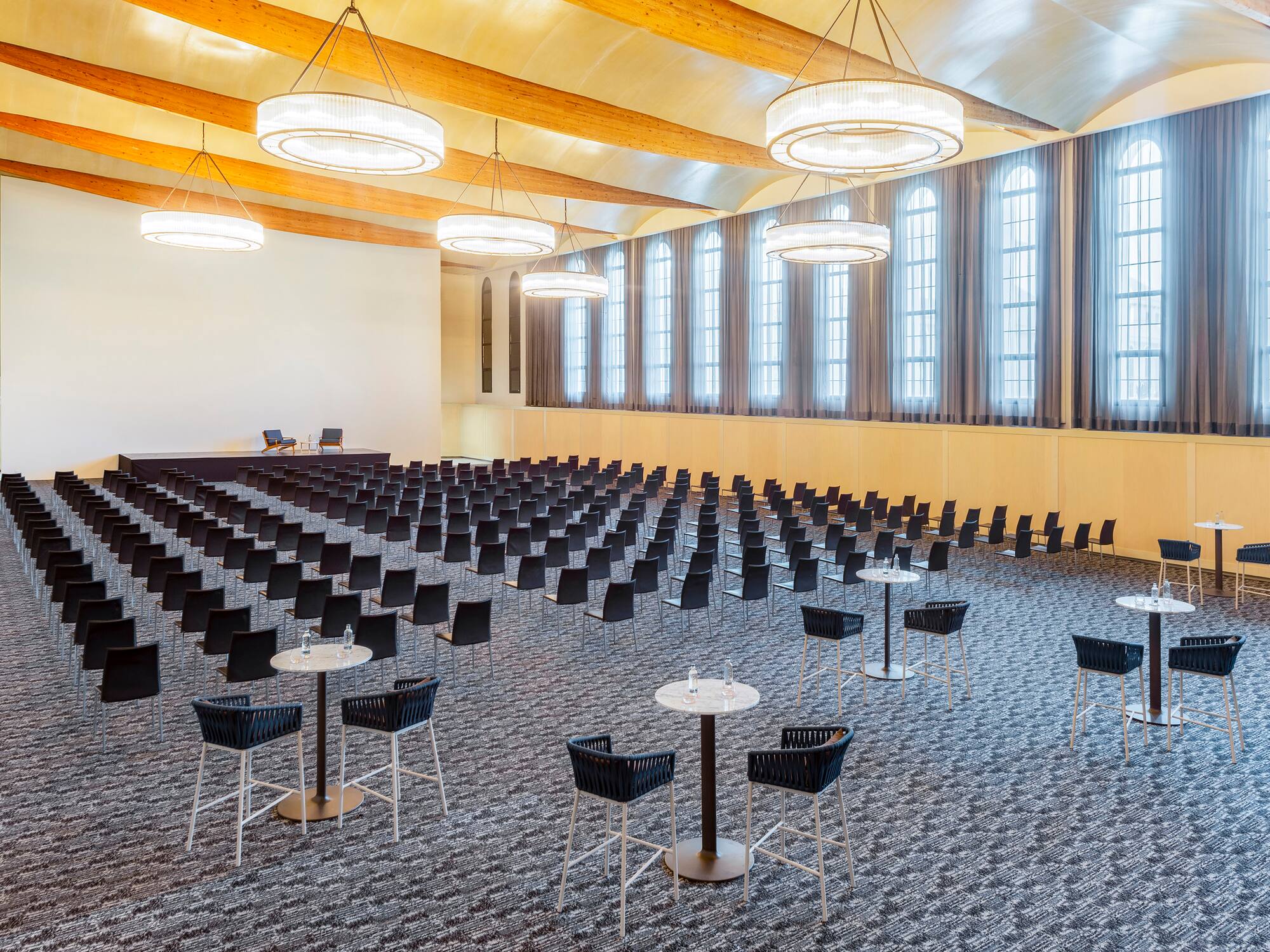 a large room with tables and chairs.