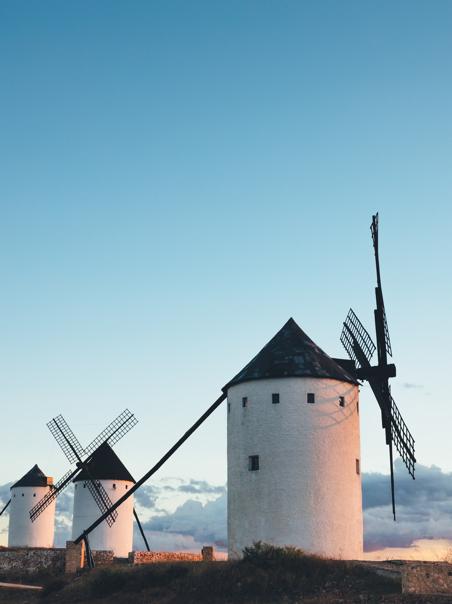 a group of windmills in a field