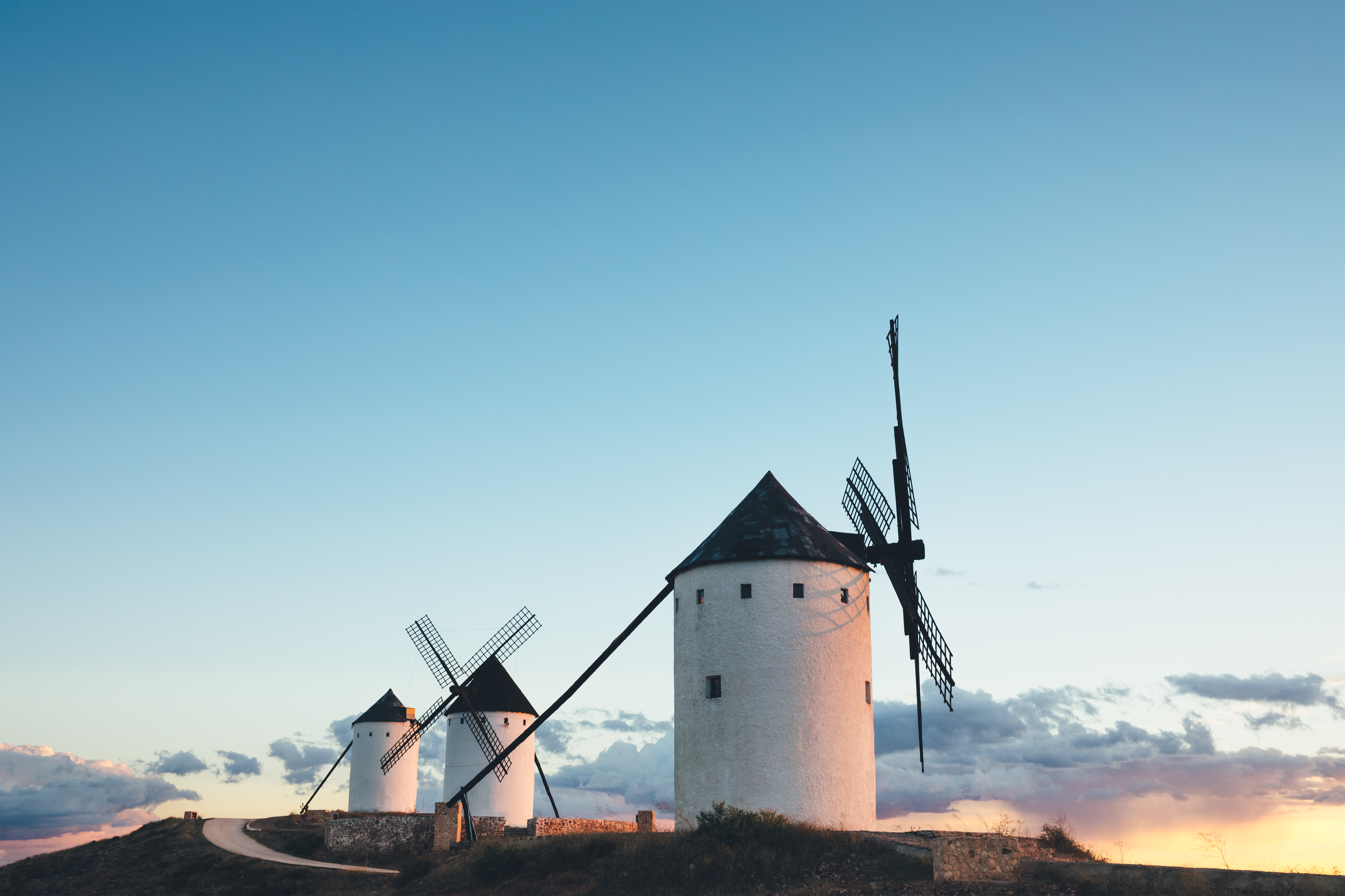a group of windmills in a field