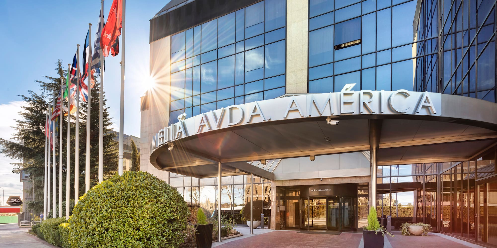 a building with flags in front of it