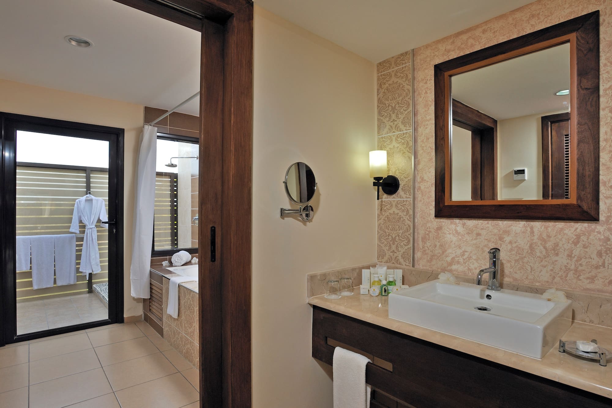 a bathroom with a mirror and sink