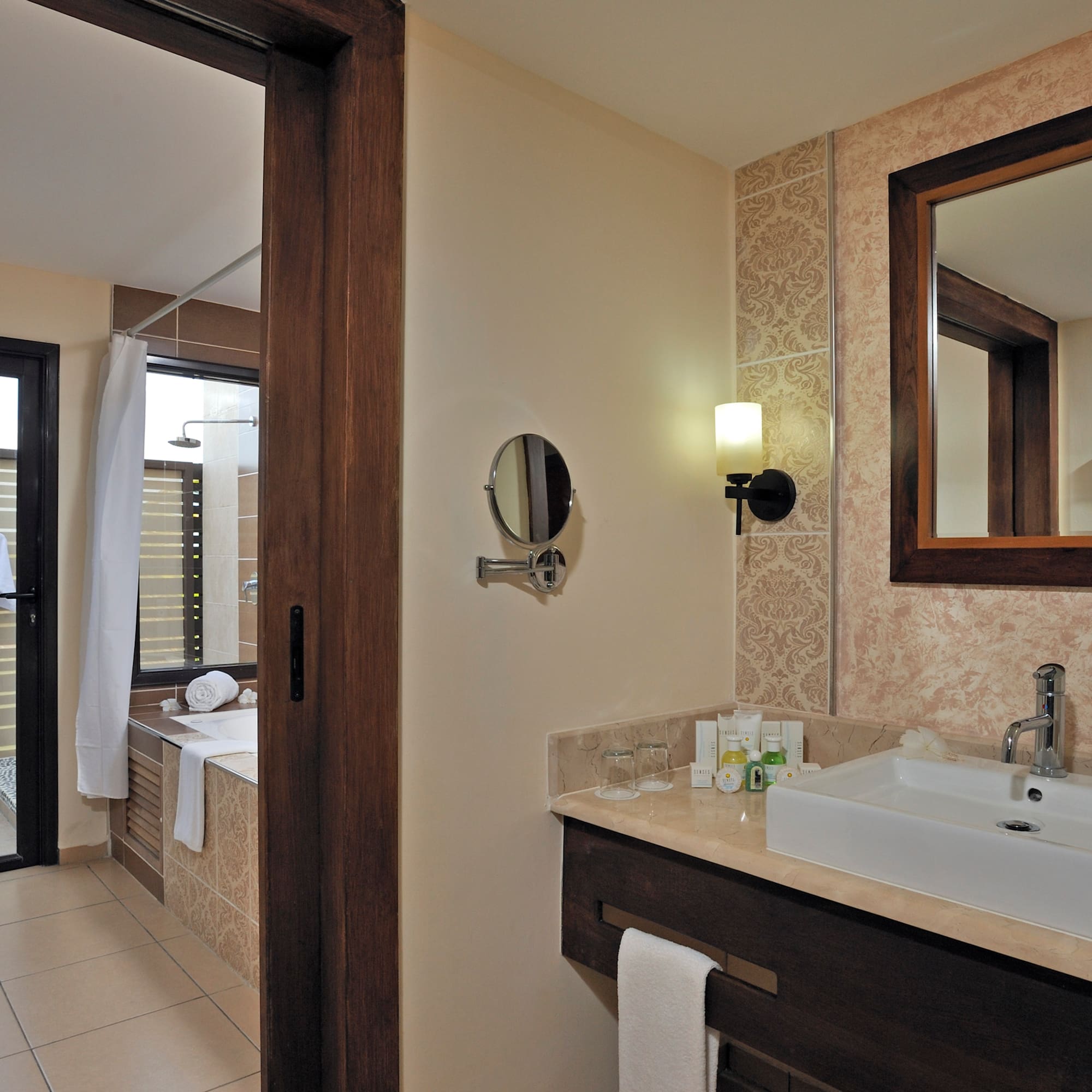 a bathroom with a mirror and sink