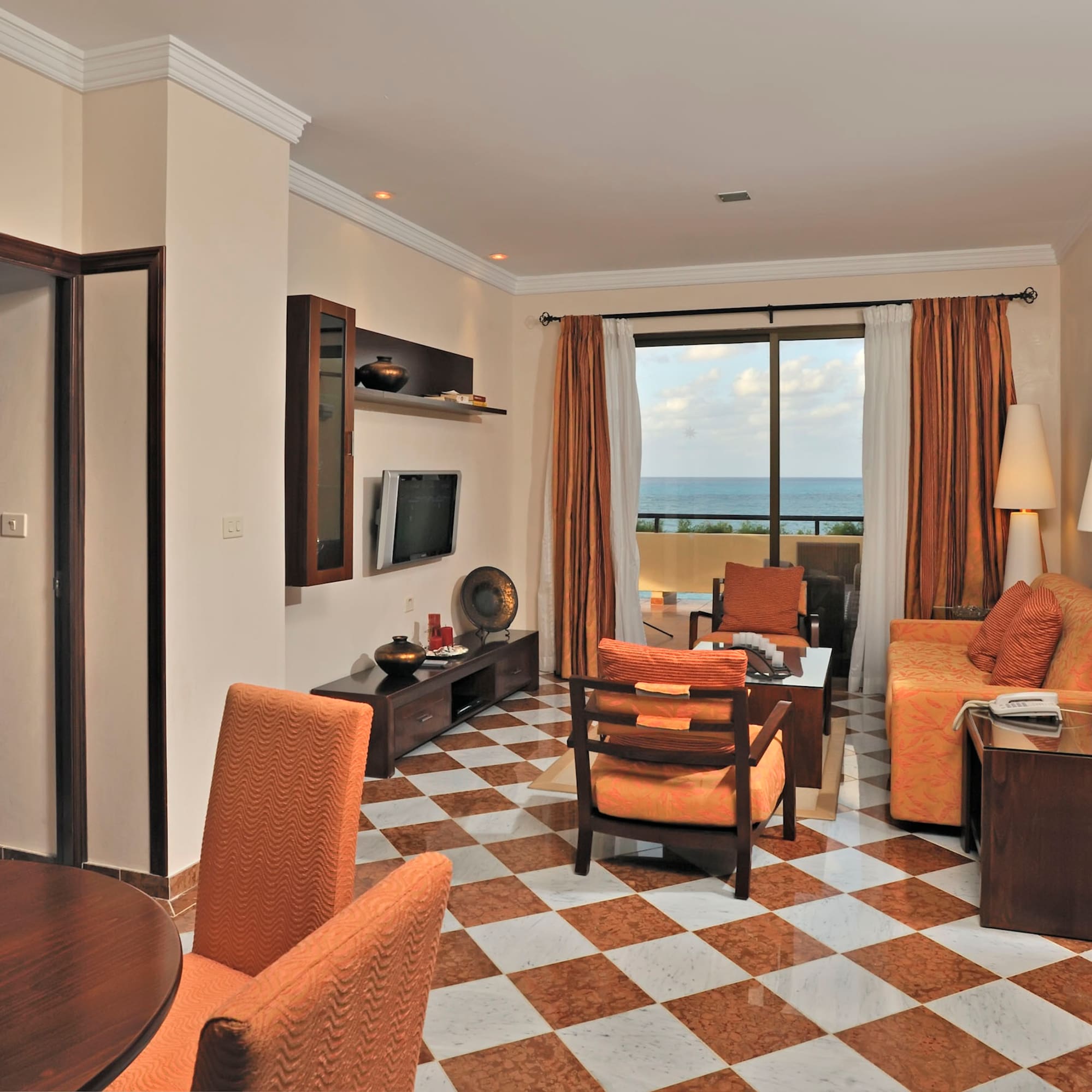 a room with a checkered floor and a couch