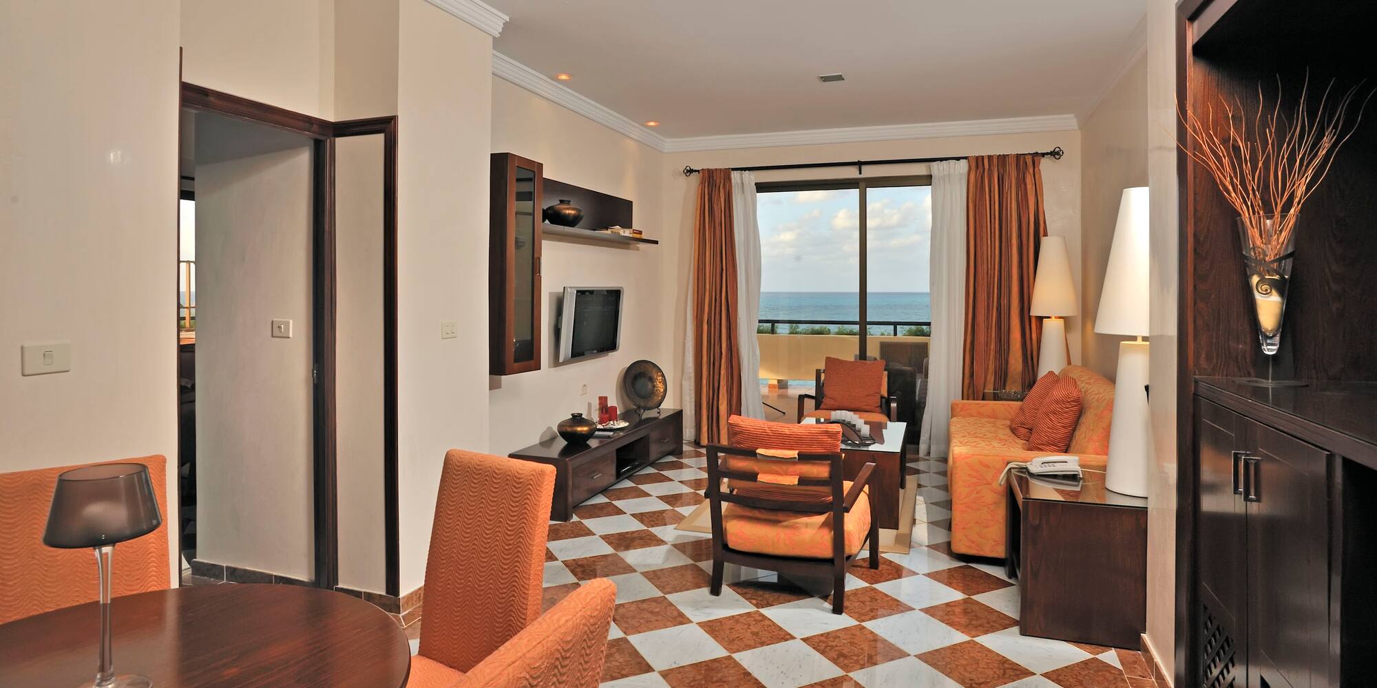 a room with a checkered floor and a couch