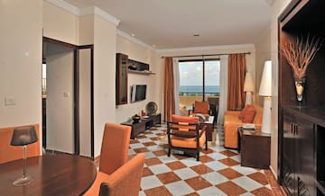 a room with a checkered floor and a couch