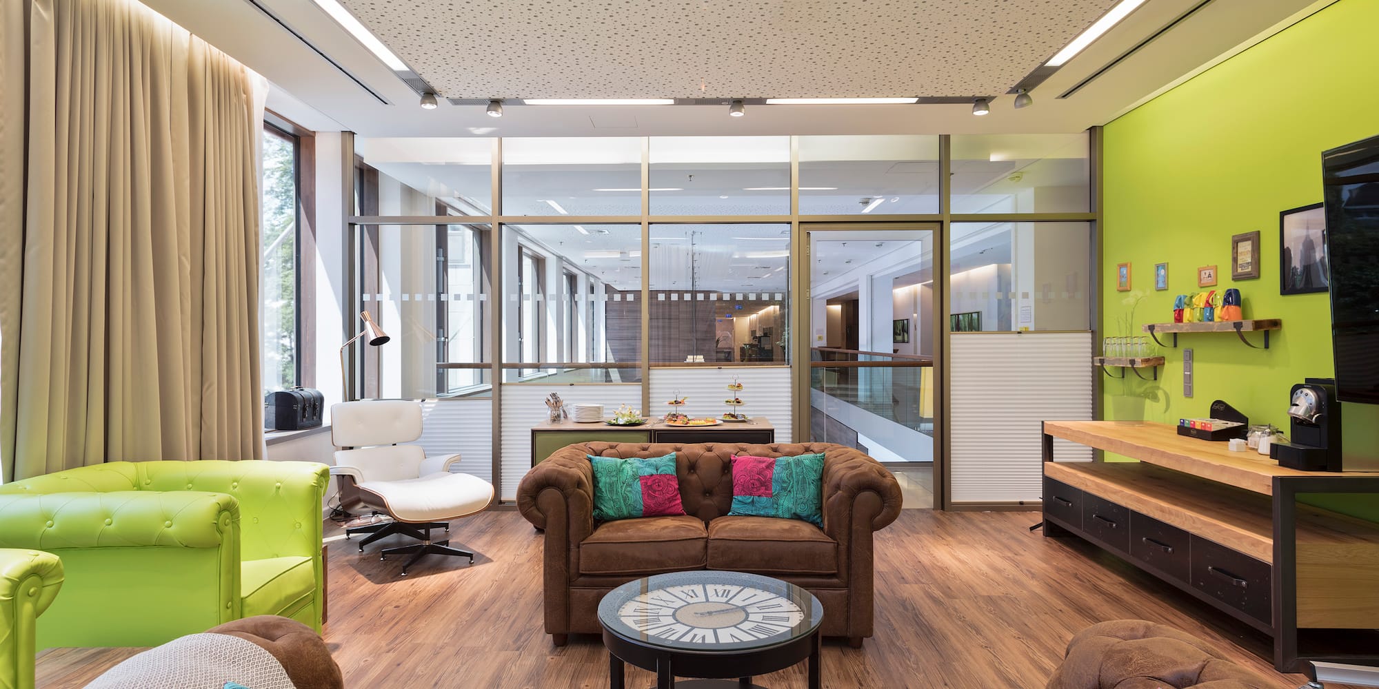 a room with couches and chairs