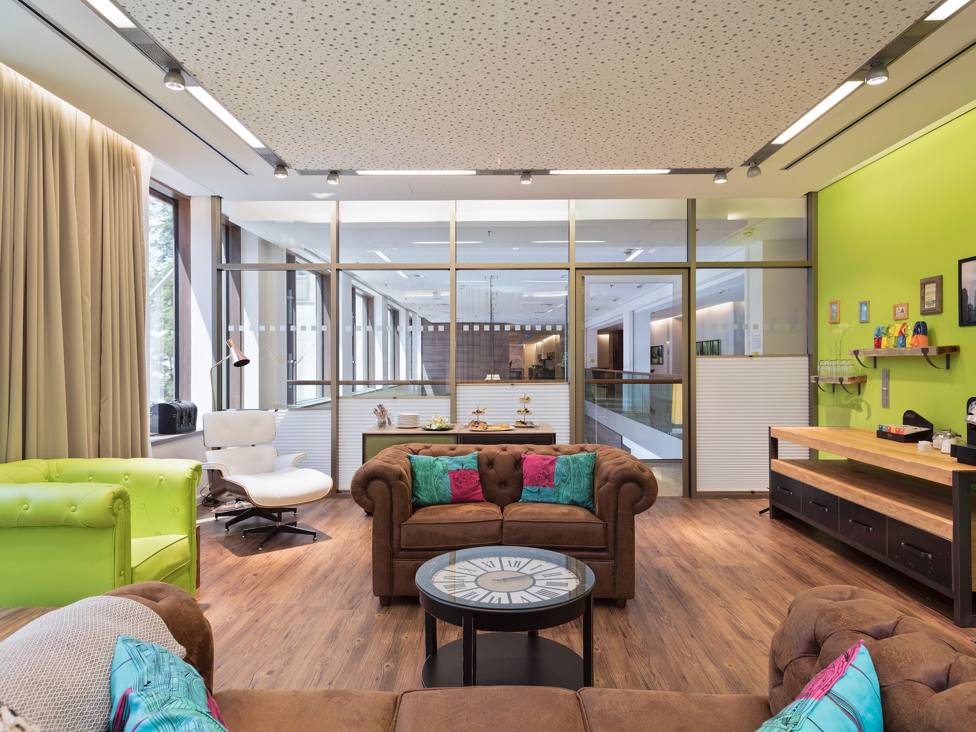 a room with couches and chairs