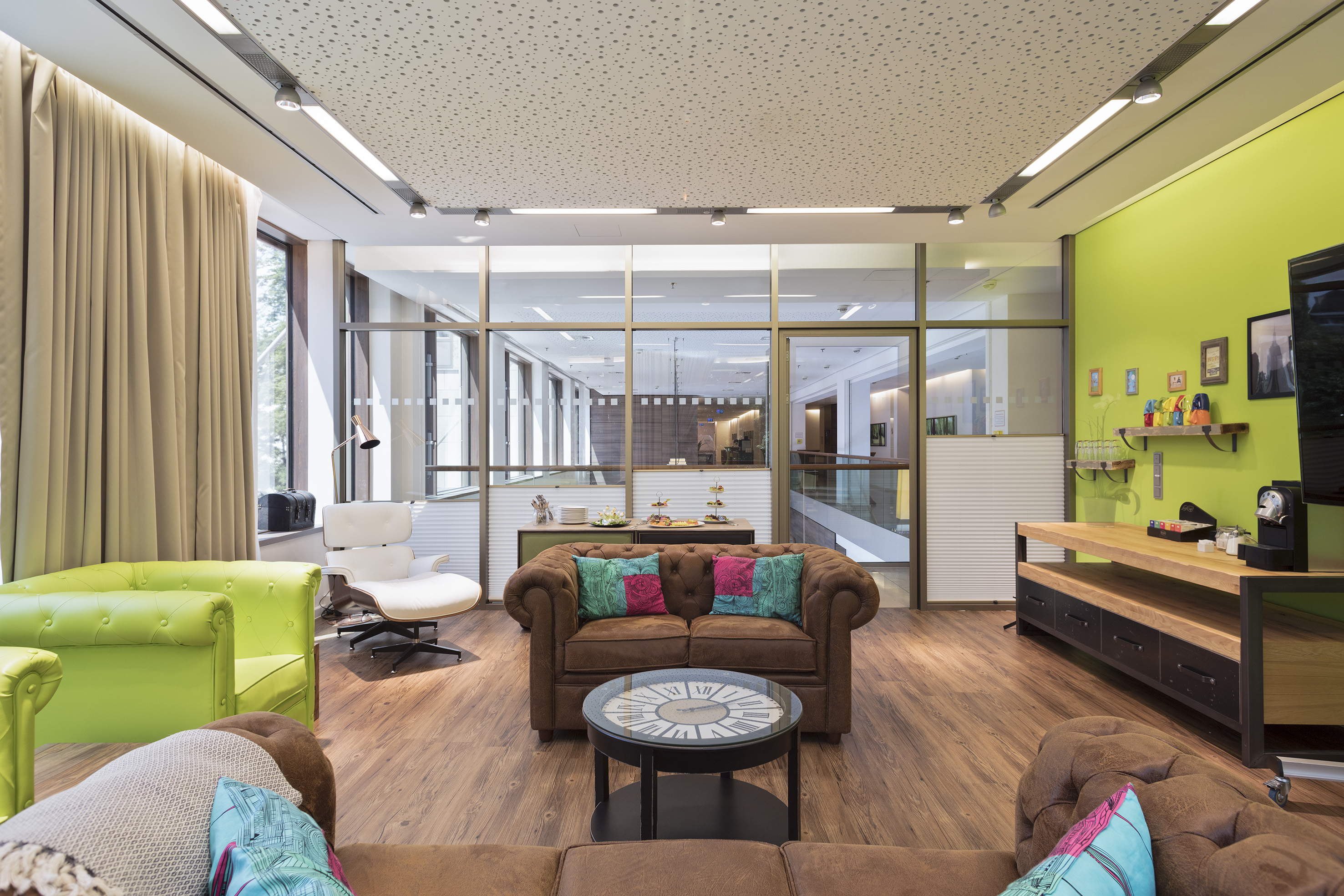 a room with couches and chairs