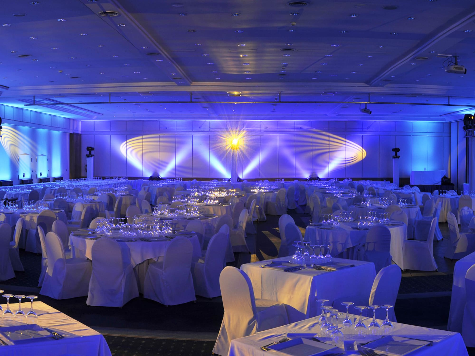 a room with tables and chairs