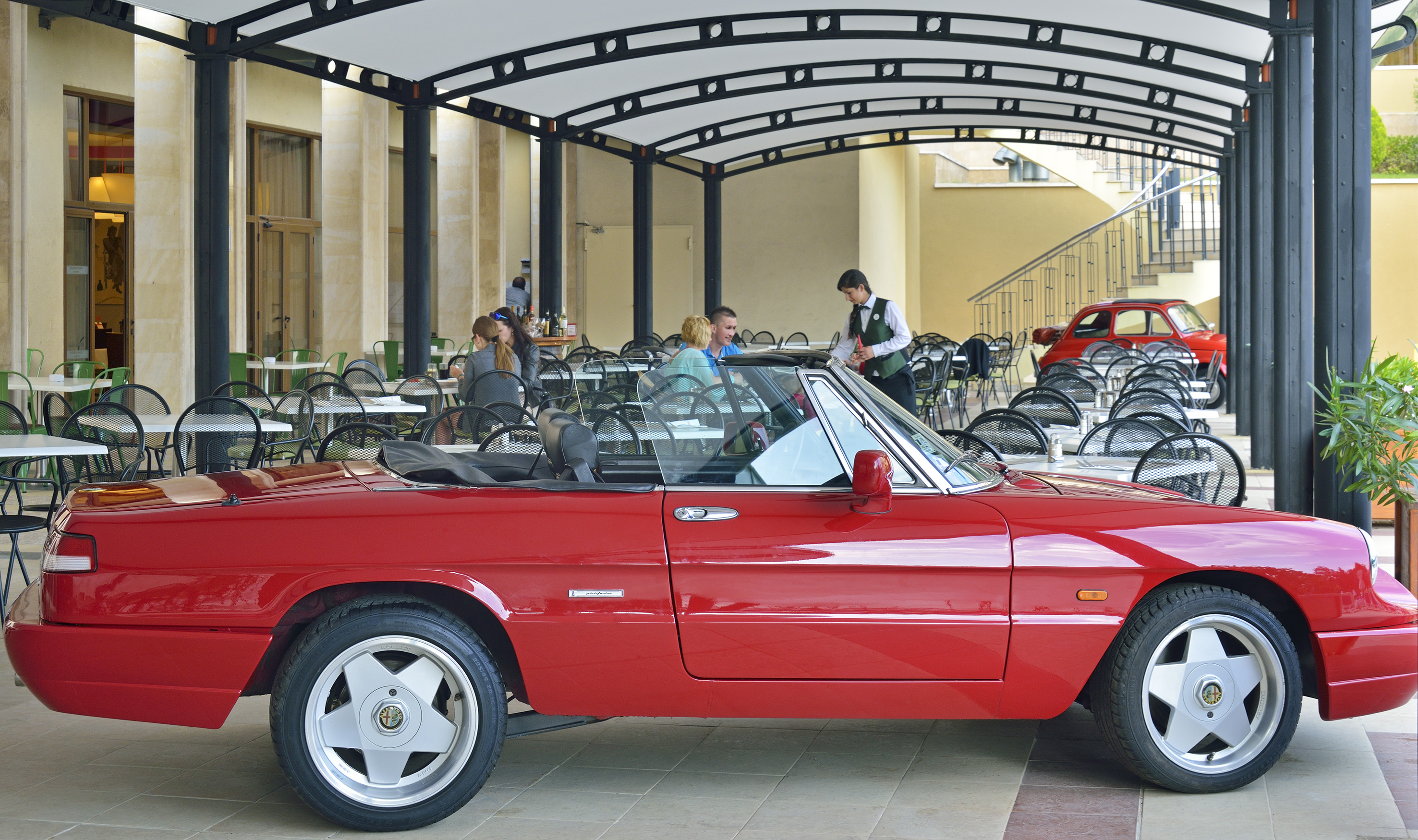 a red car parked in a restaurant