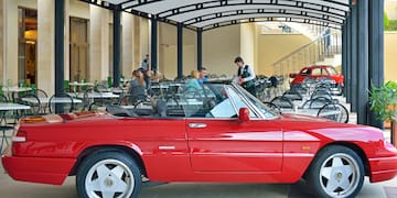 a red car parked in a restaurant