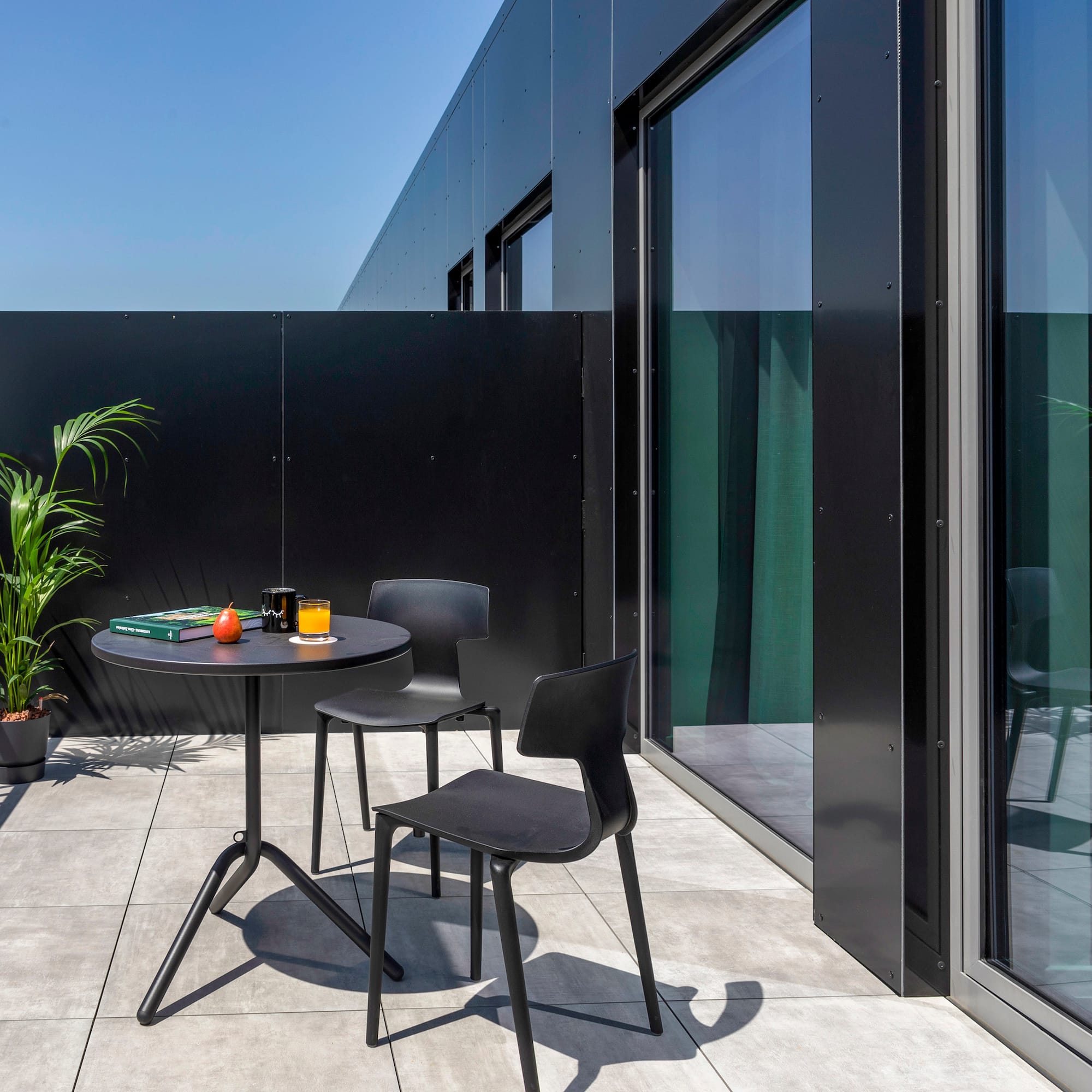 a table and chairs on a patio
