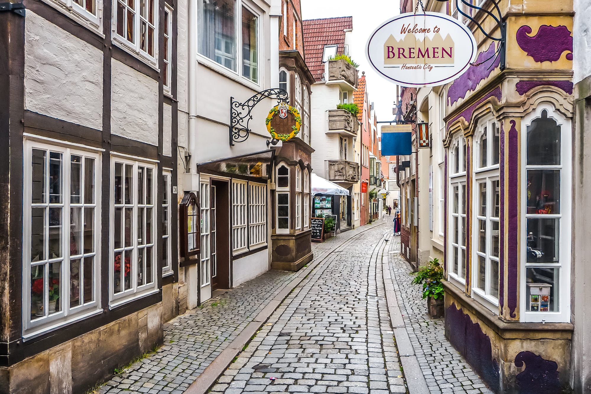a street with buildings and signs