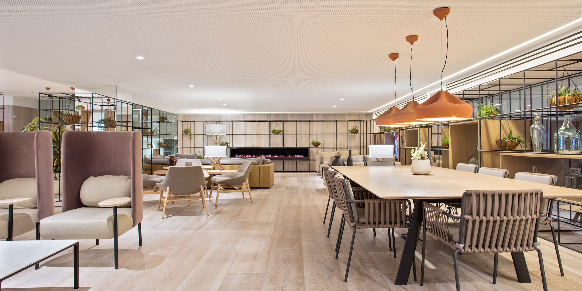 a large room with a table and chairs