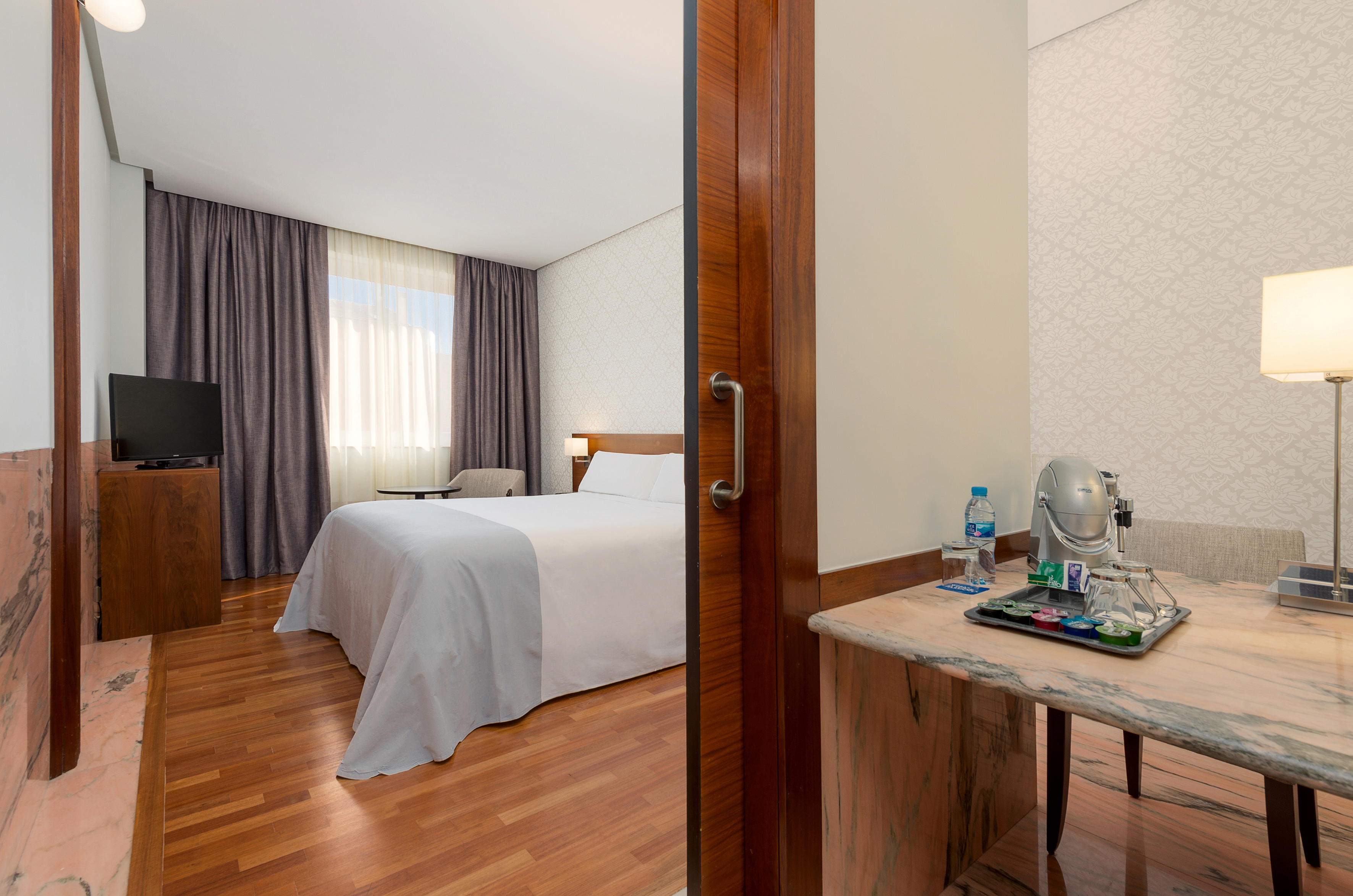 a room with a bed and a table