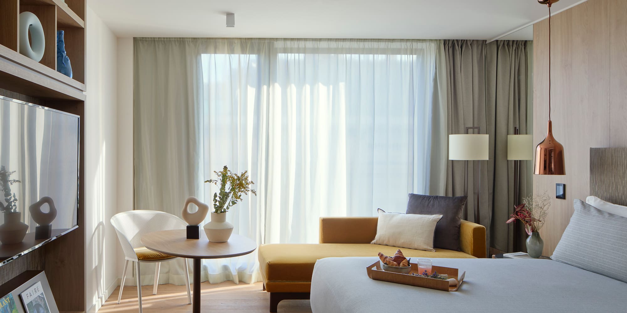 a room with a bed and a couch