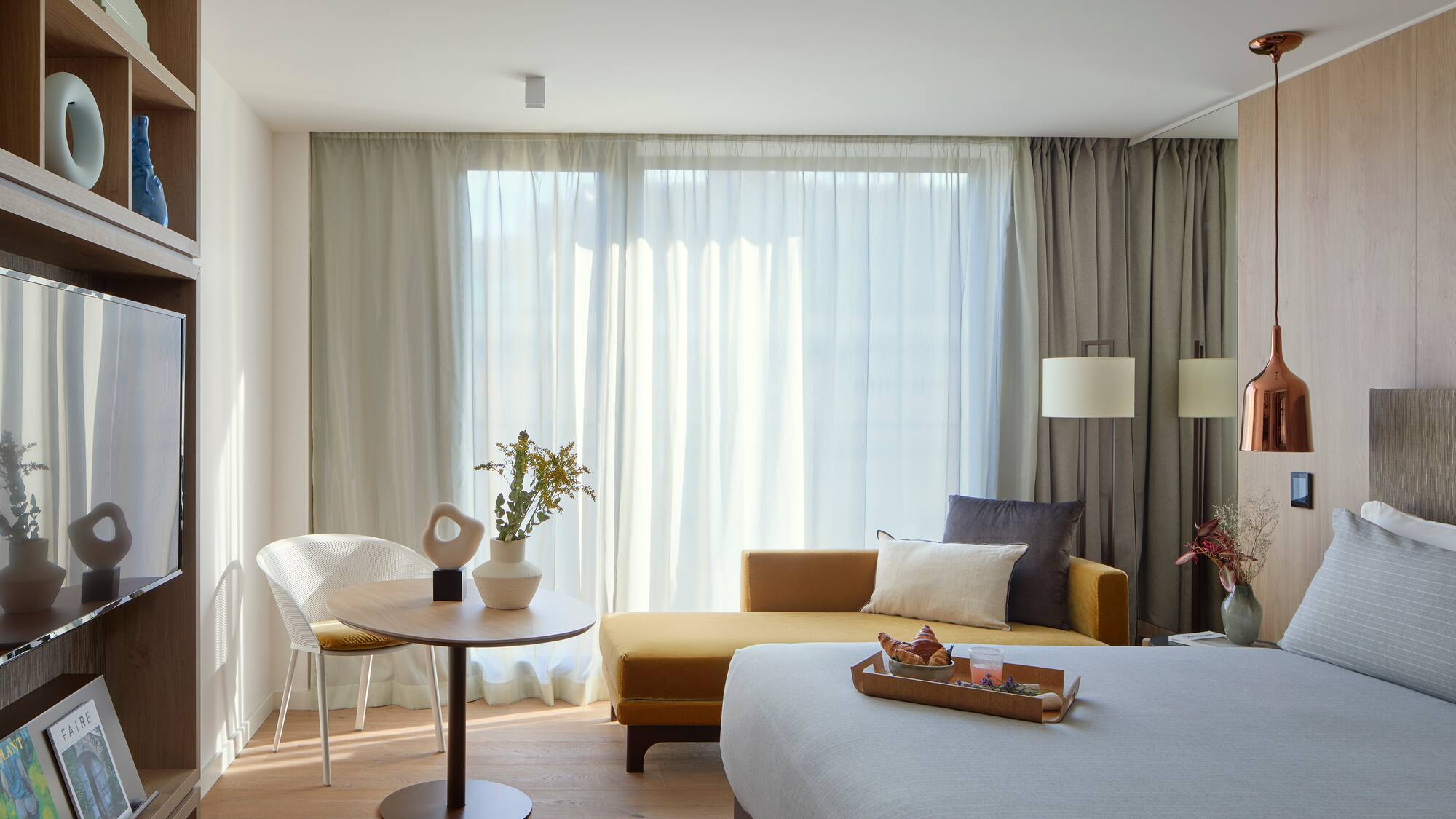 a room with a bed and a couch