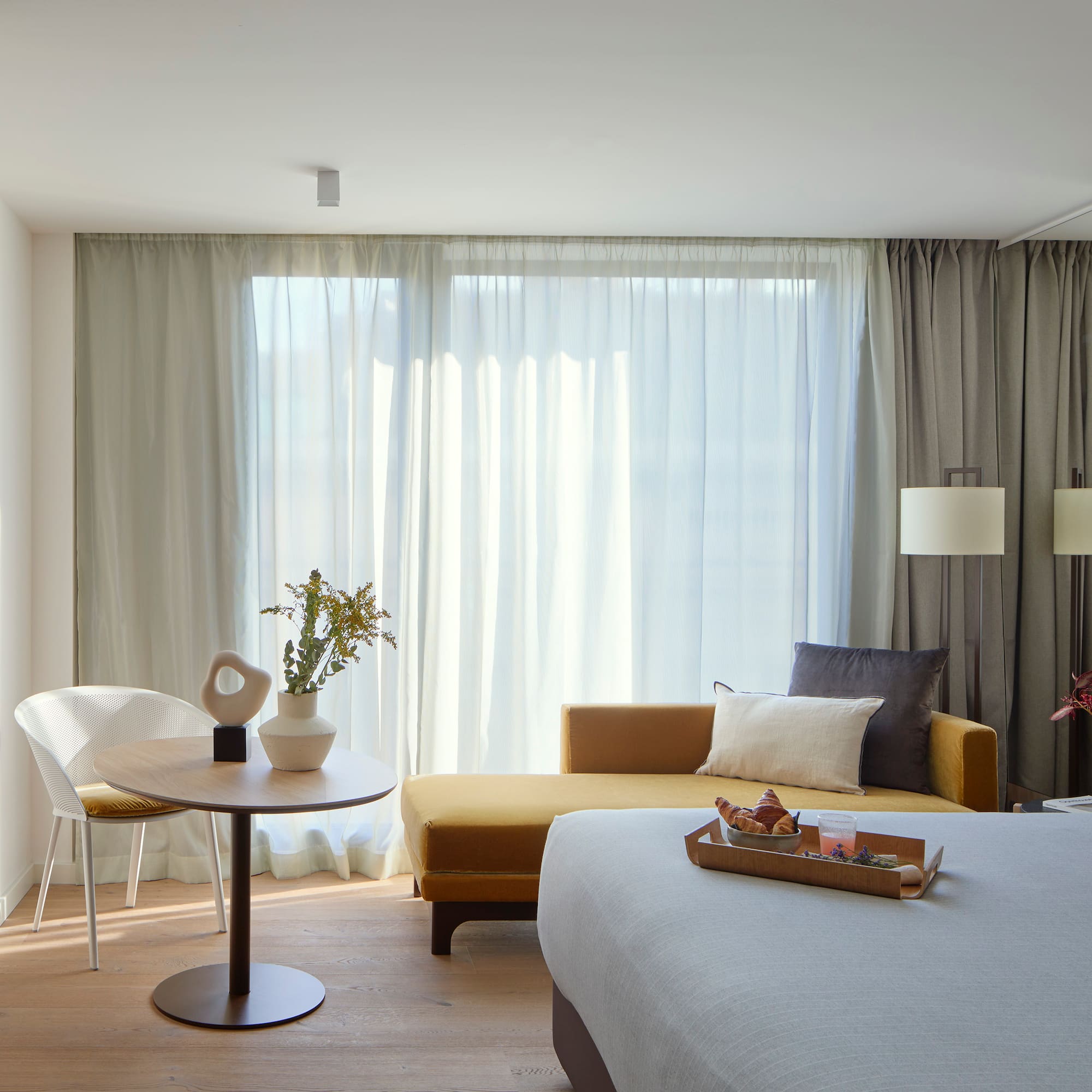 a room with a bed and a couch