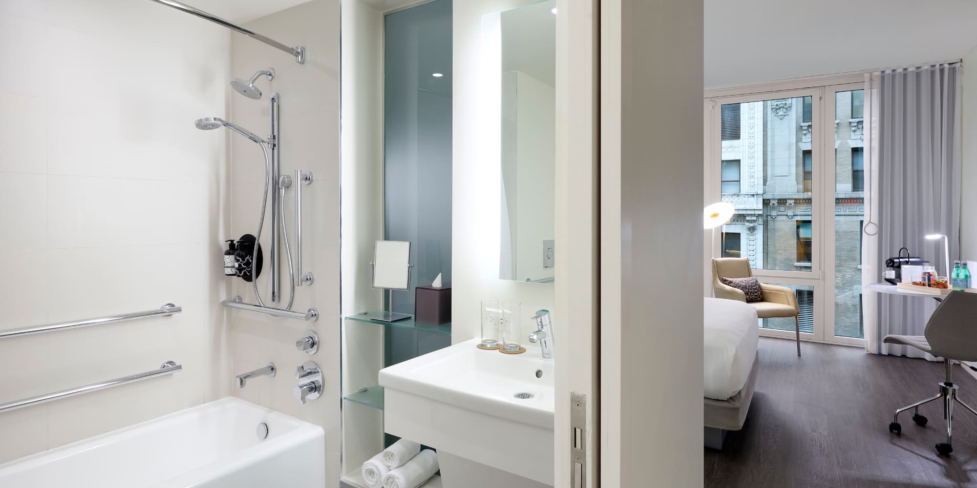 a bathroom with a bathtub and shower