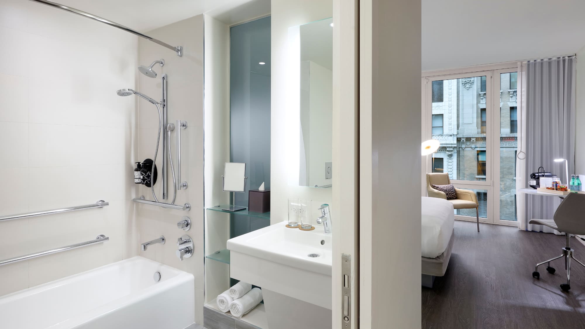 a bathroom with a bathtub and shower