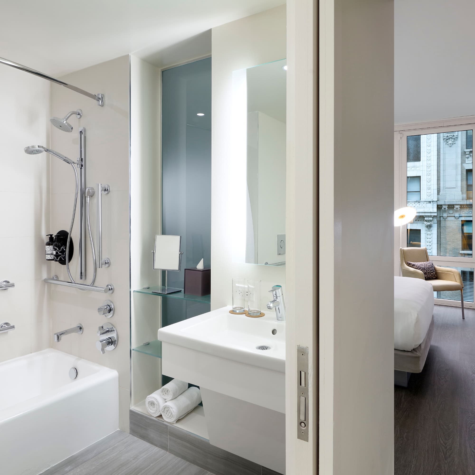 a bathroom with a bathtub and shower